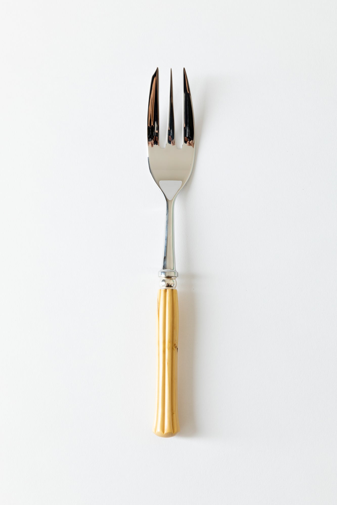 Flatware with fluted boxwood handle.