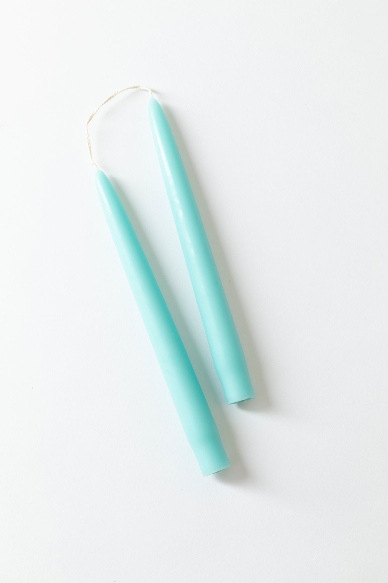 Hand-dipped wax candle tapers in juicy colors.