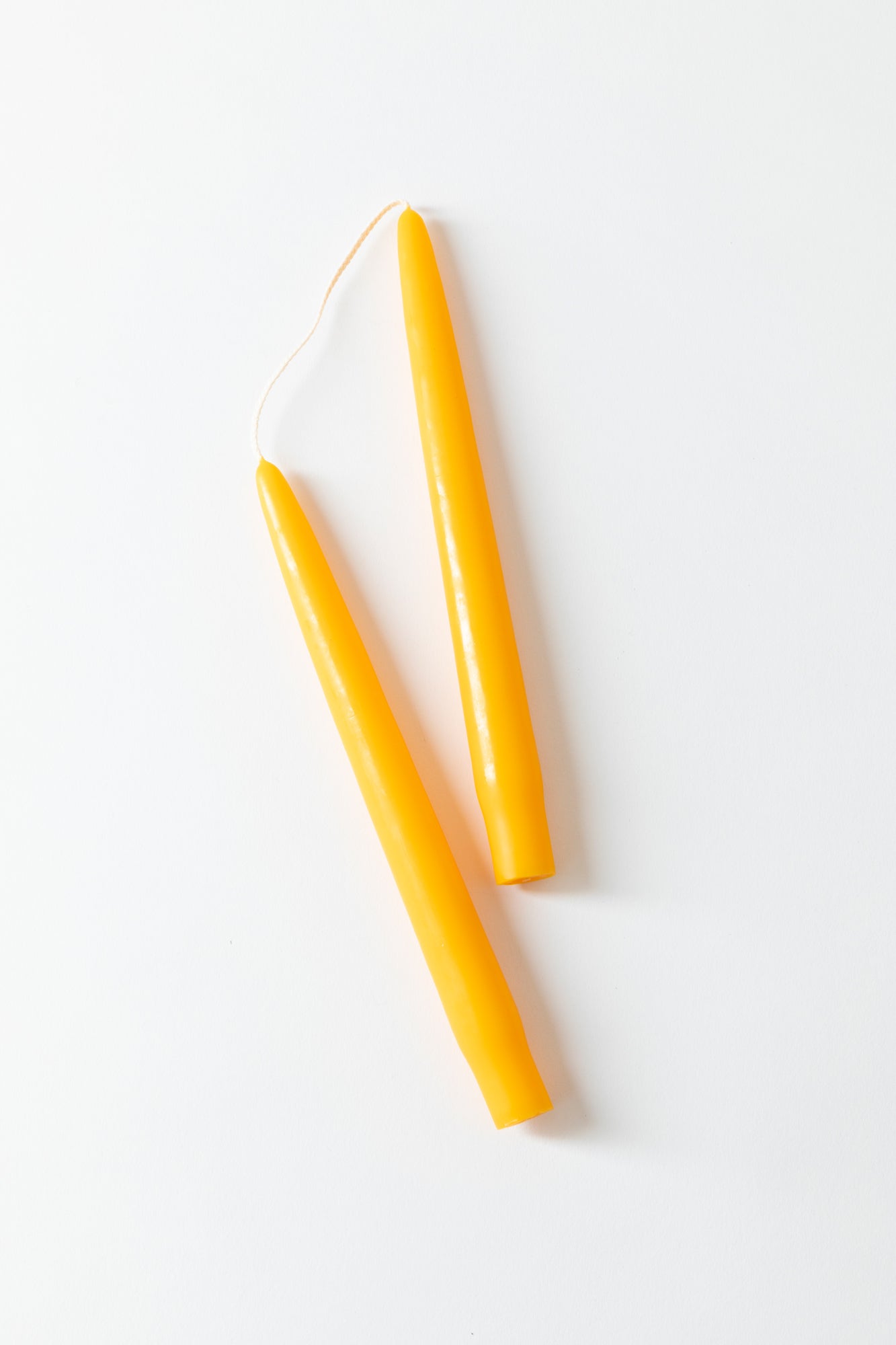 Hand-dipped wax candle tapers in juicy colors.