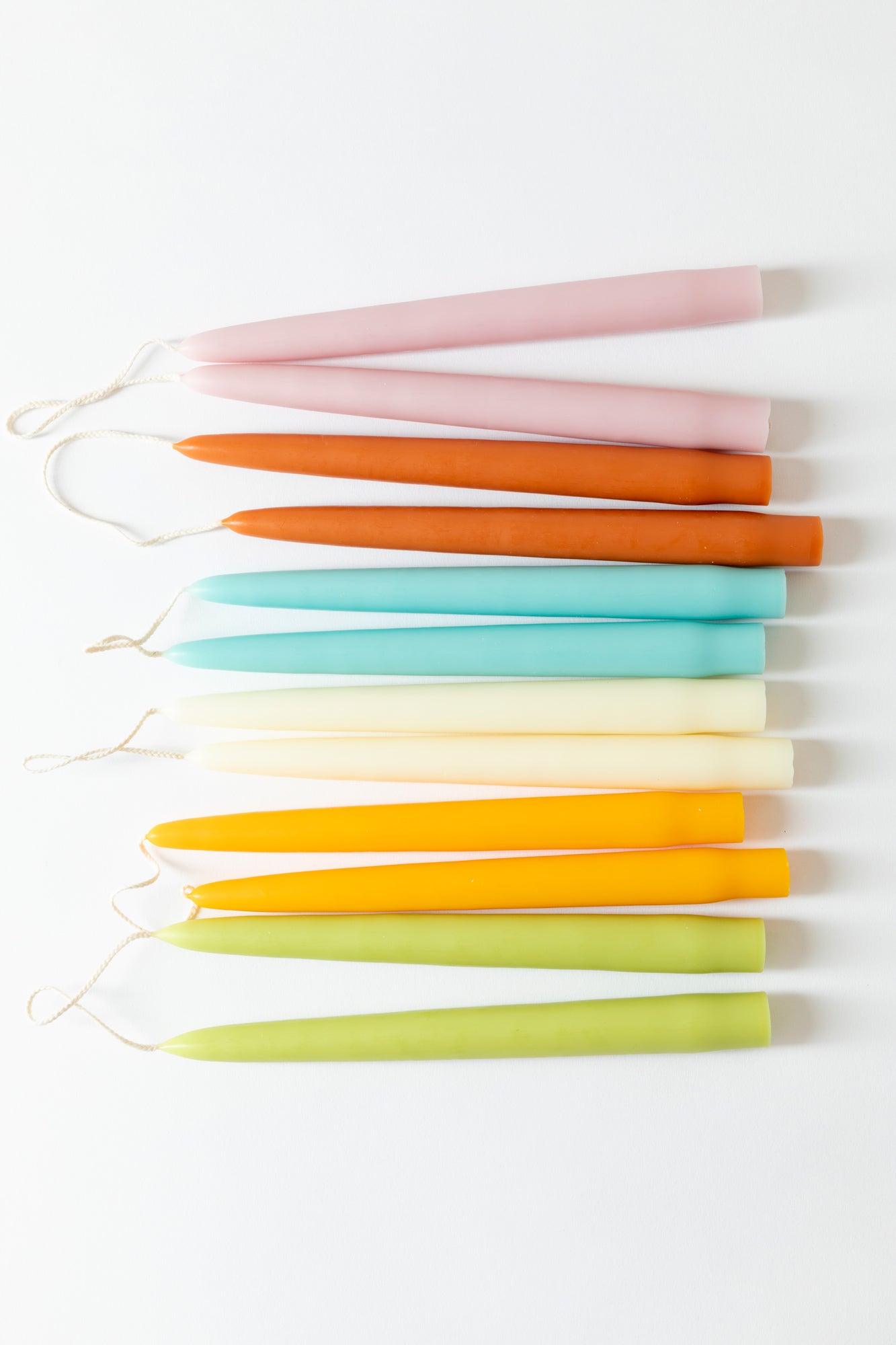 Hand-dipped wax candle tapers in juicy colors.