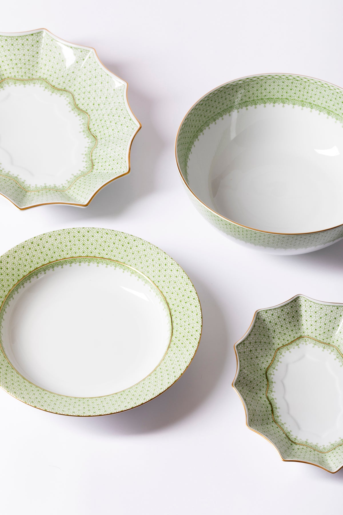 Dinner set with original cobalt based Blue Lace teardrop apple green border.