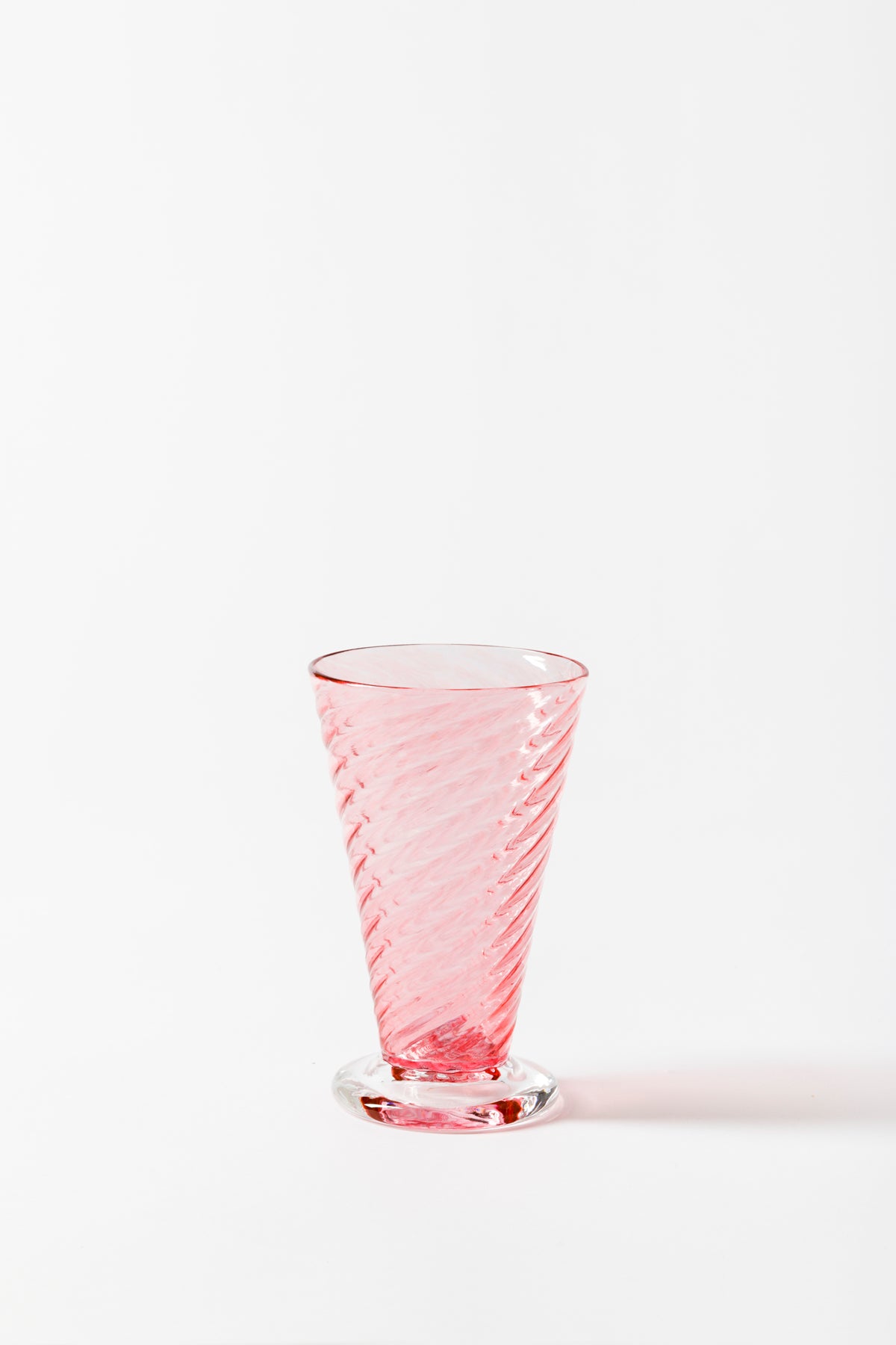 Twisted glass goblets in blush handblown by Tracy Glover.