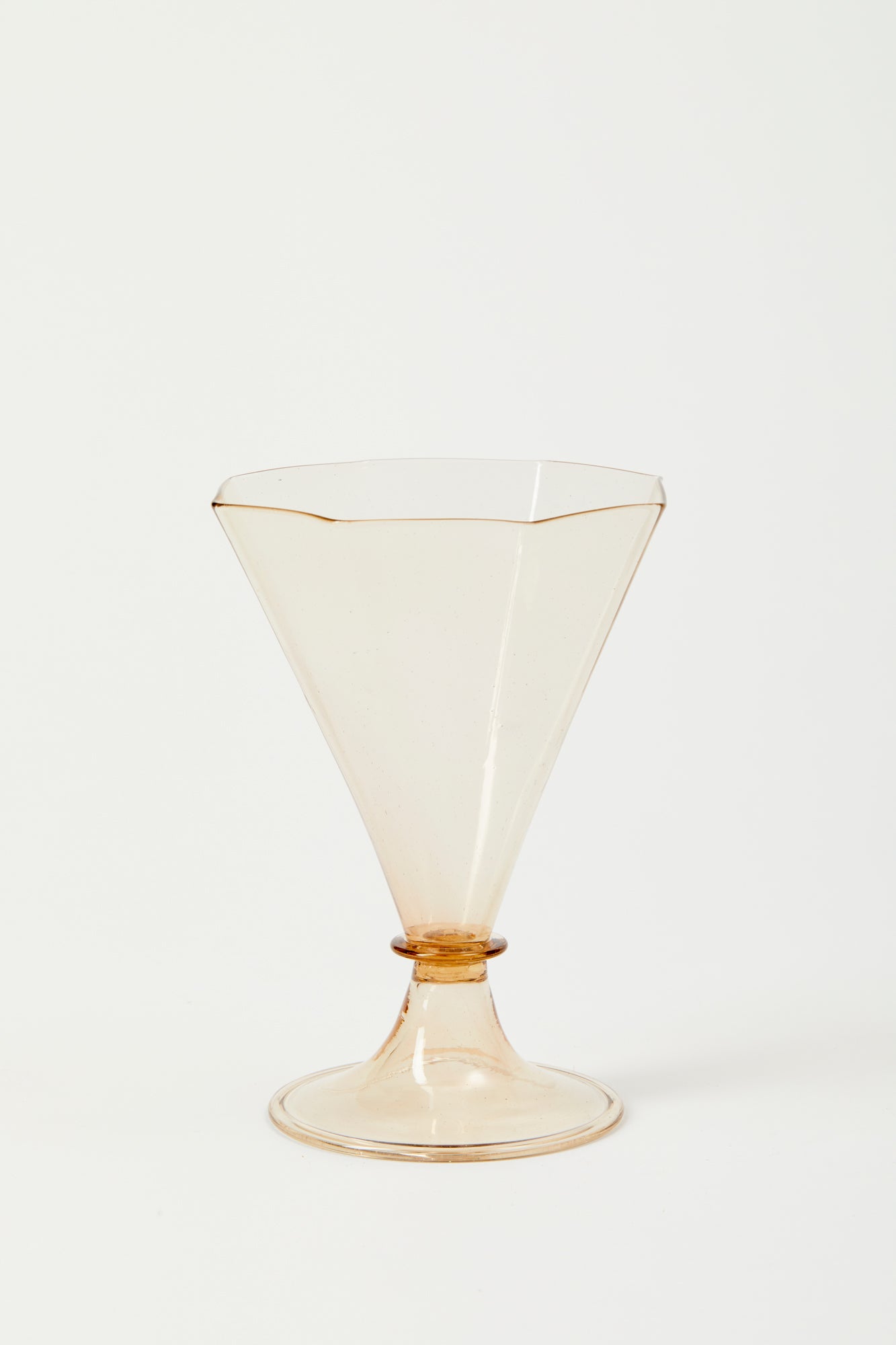 Fine and delicate octagonal glass with neutral warm and smoke color in the style of Salviati. Handblown and molded by artisans in Murano.