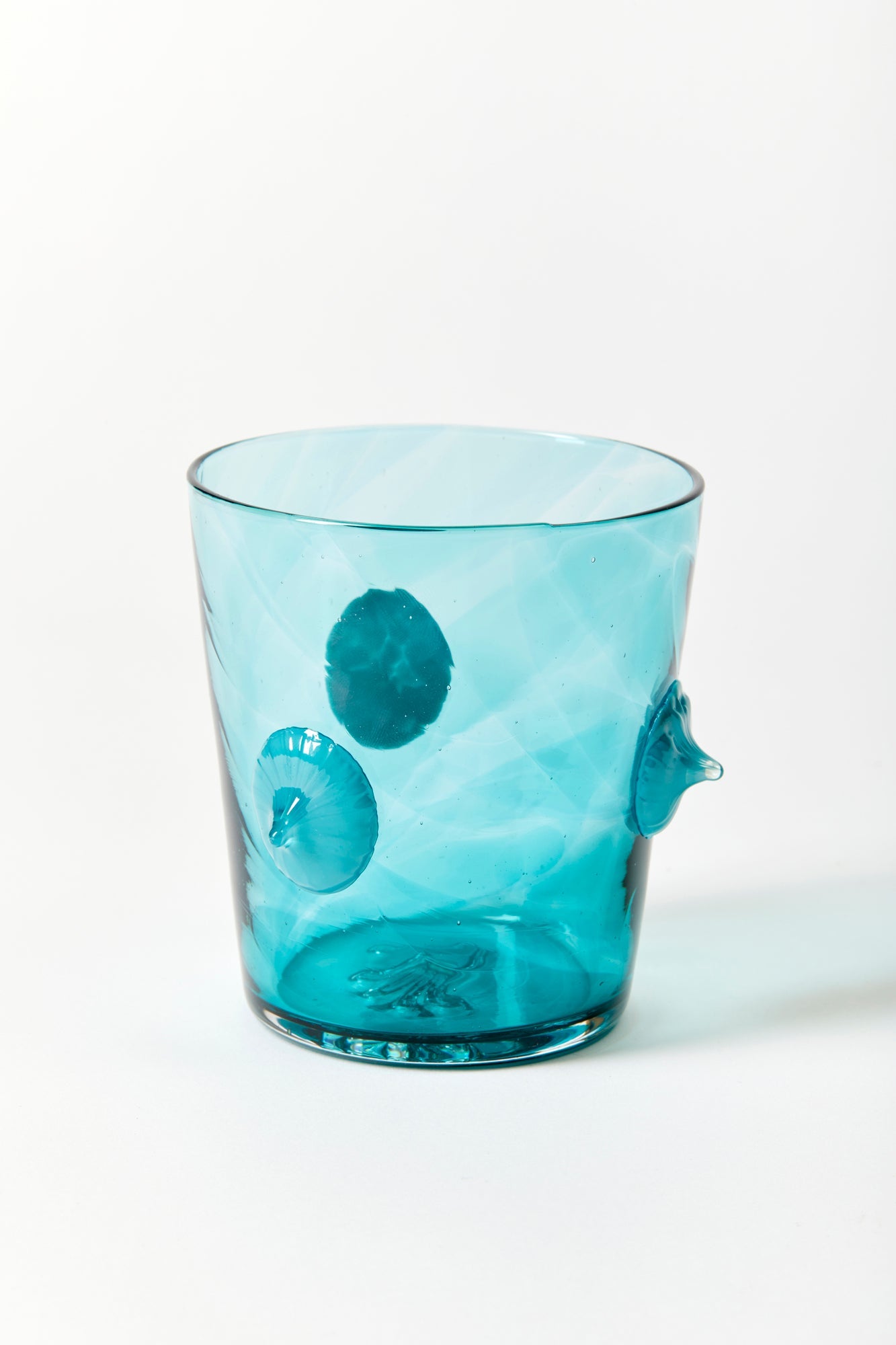 Asp & Hand is a glass design studio in the Pacific Northwest founded by artists and couple Blair and Eli Hansen.
