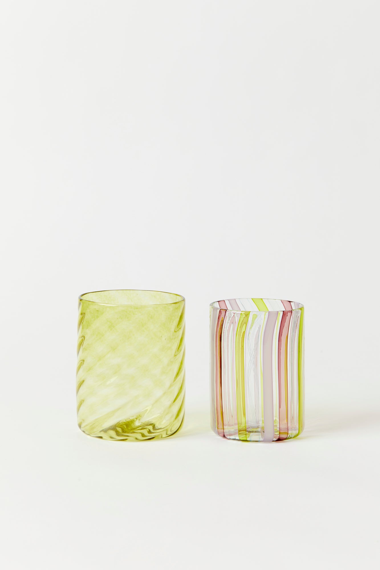 Chartreuse twisted glass tumbler handblown by Tracy Glover.