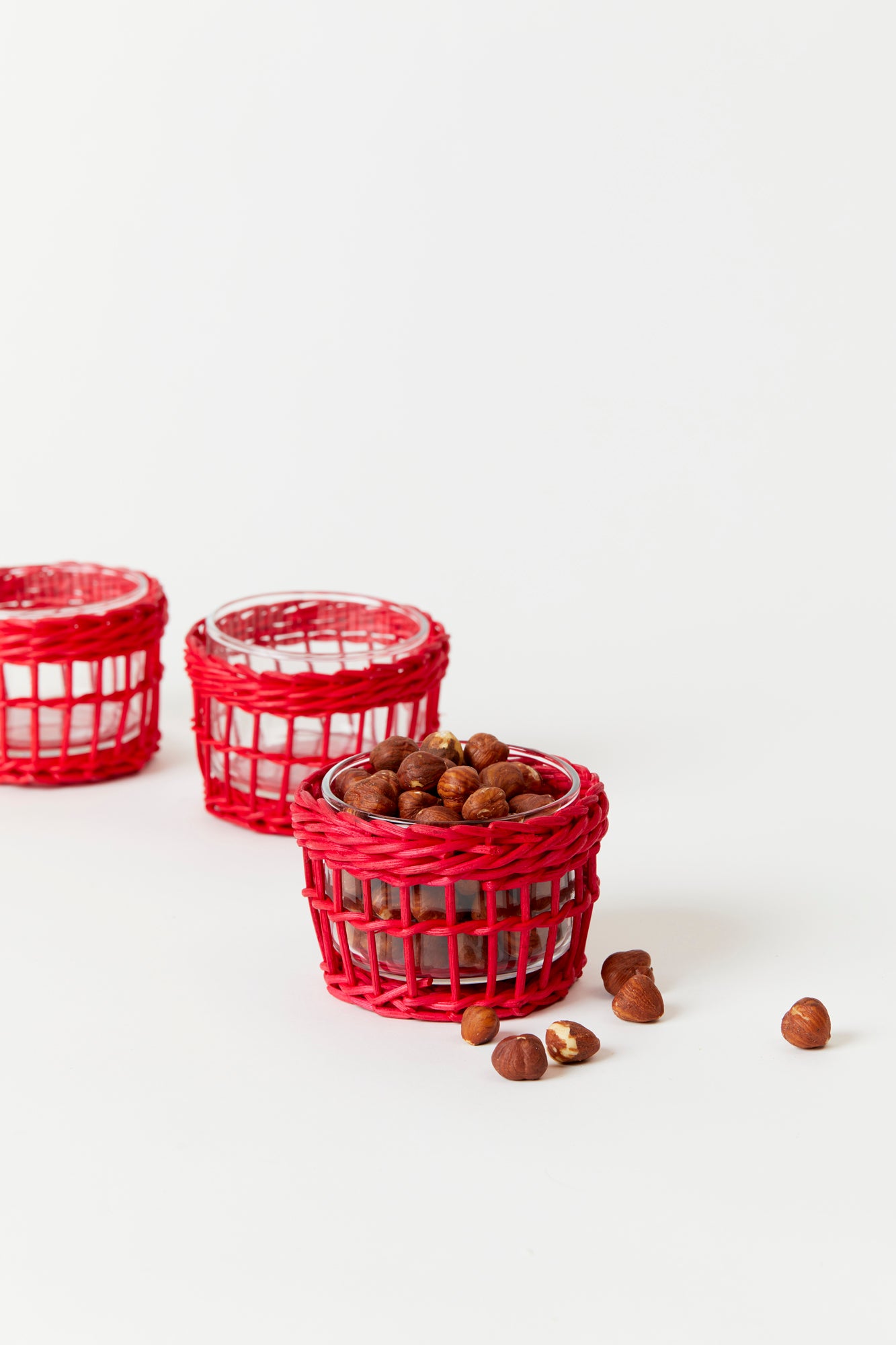 Red and green wicker snack dish.