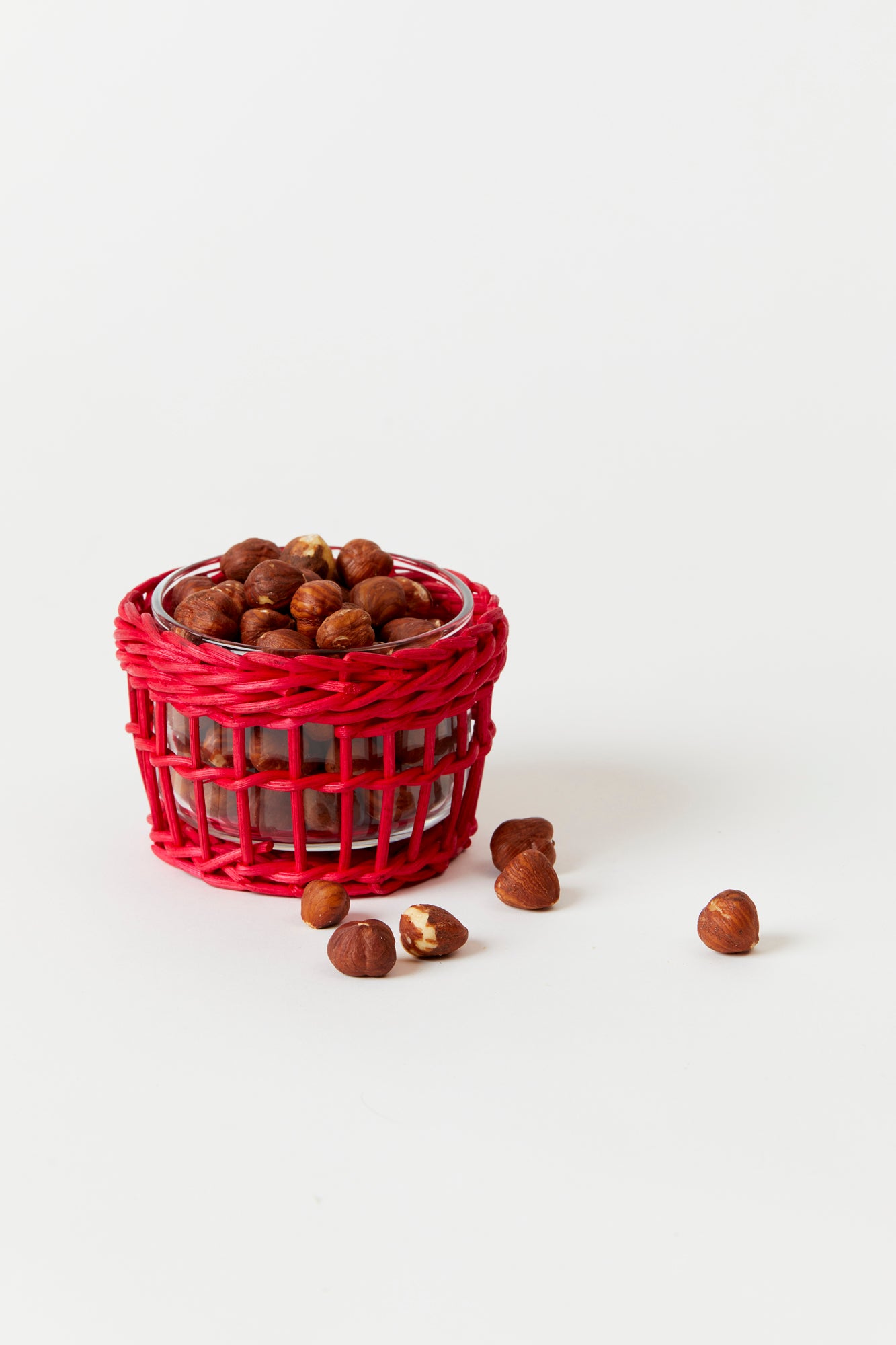 Red and green wicker snack dish.