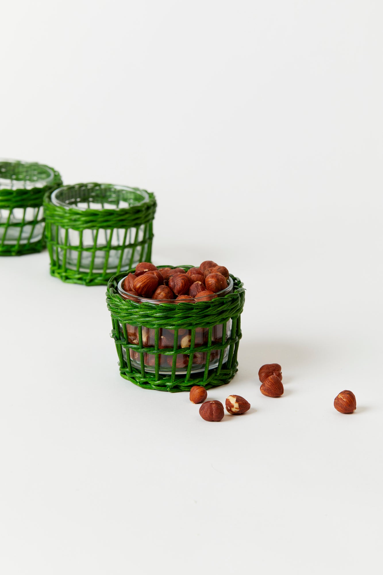 Red and green wicker snack dish.