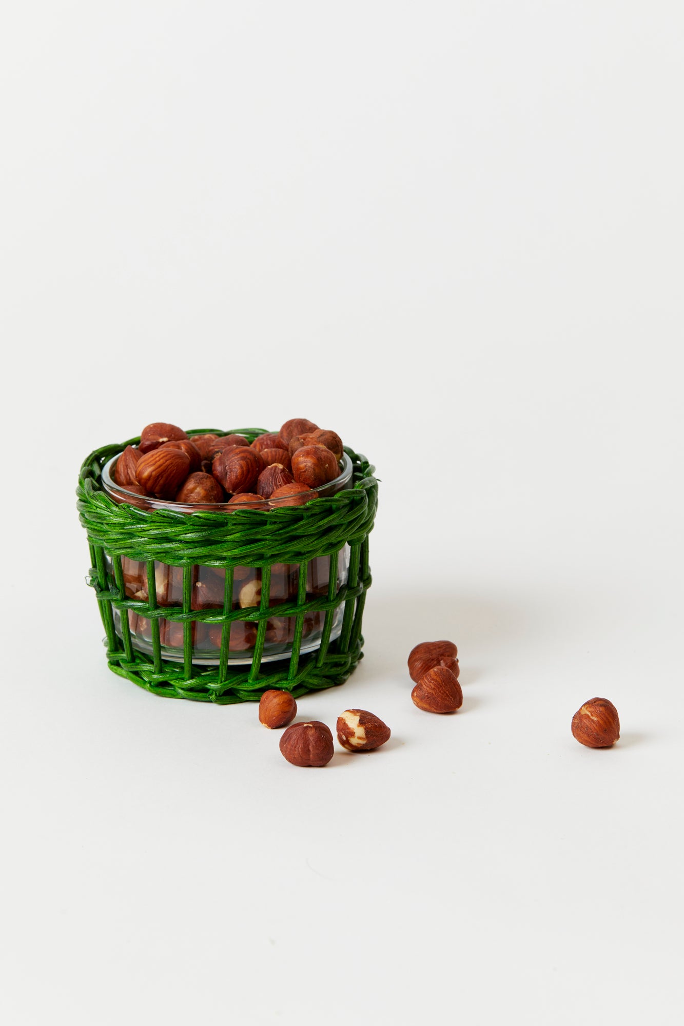 Red and green wicker snack dish.