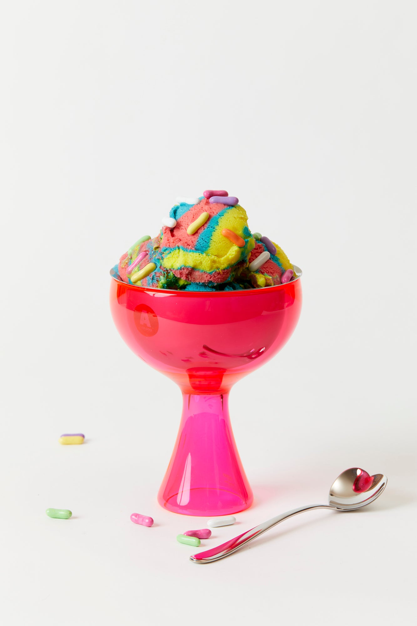 Pink acrylic ice cream compote and spoon.