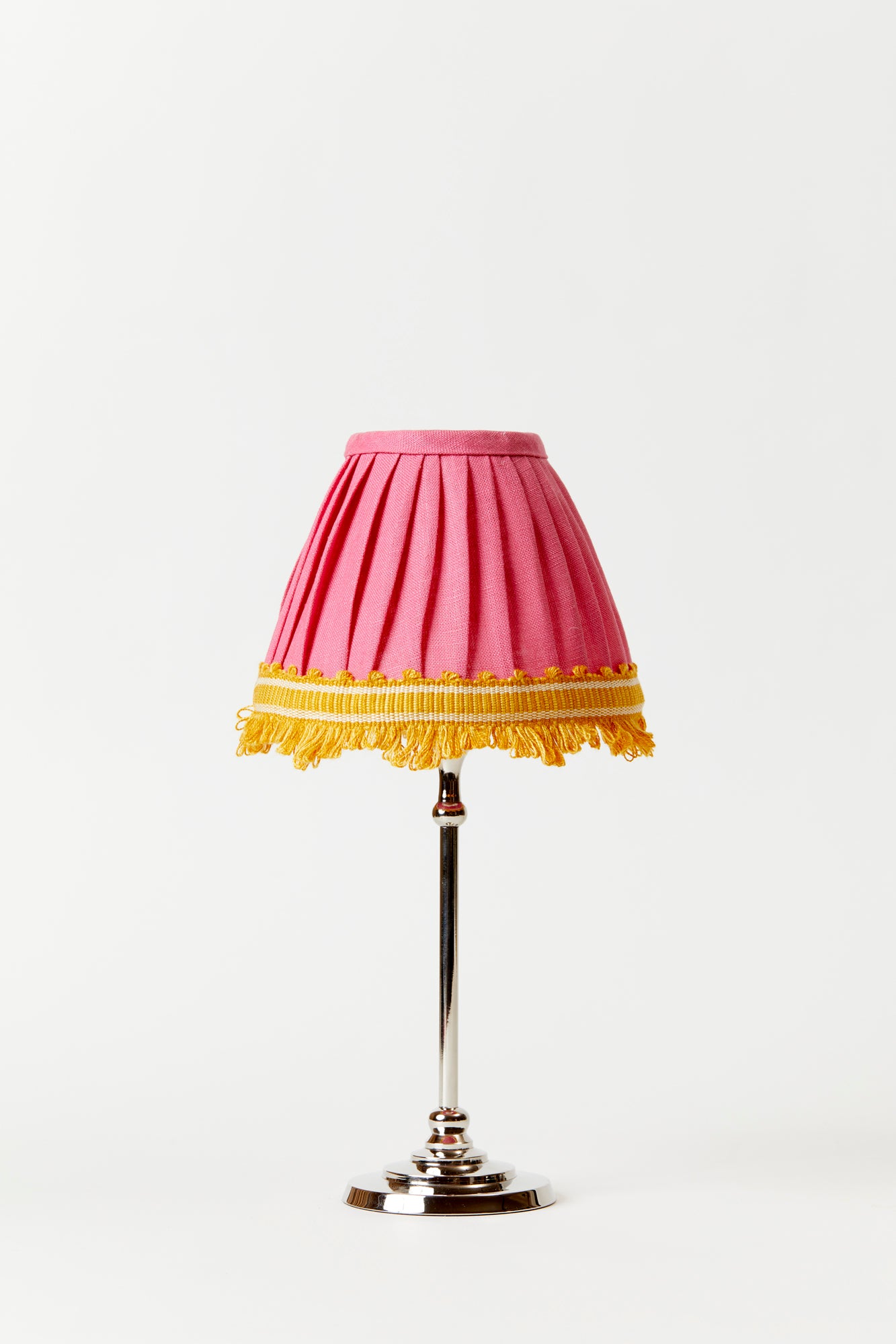 Marvelous coral hand-pleated shade with yellow fringe.