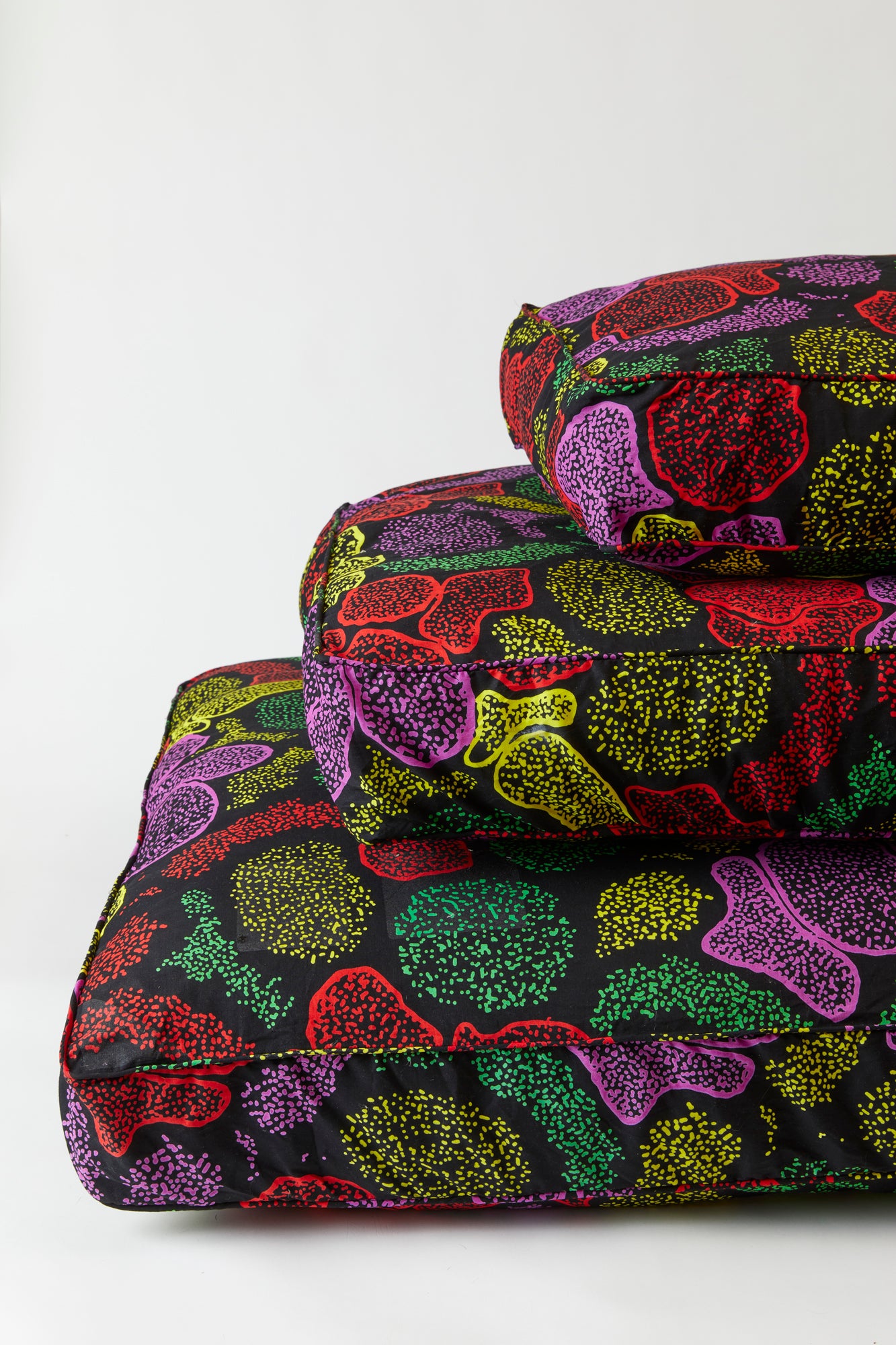 Floor cushions. The designs are inspired by over 100 years of African wax print tradition with a twist to incorporate modern South African aesthetics.