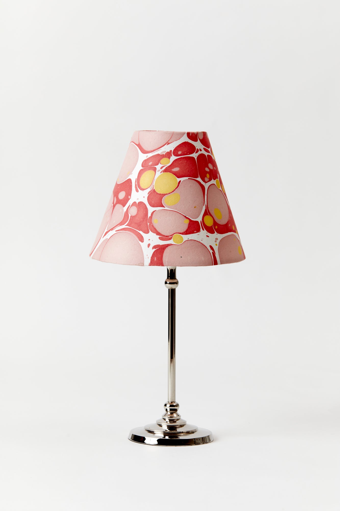 Pink marbled paper table lamp shade.