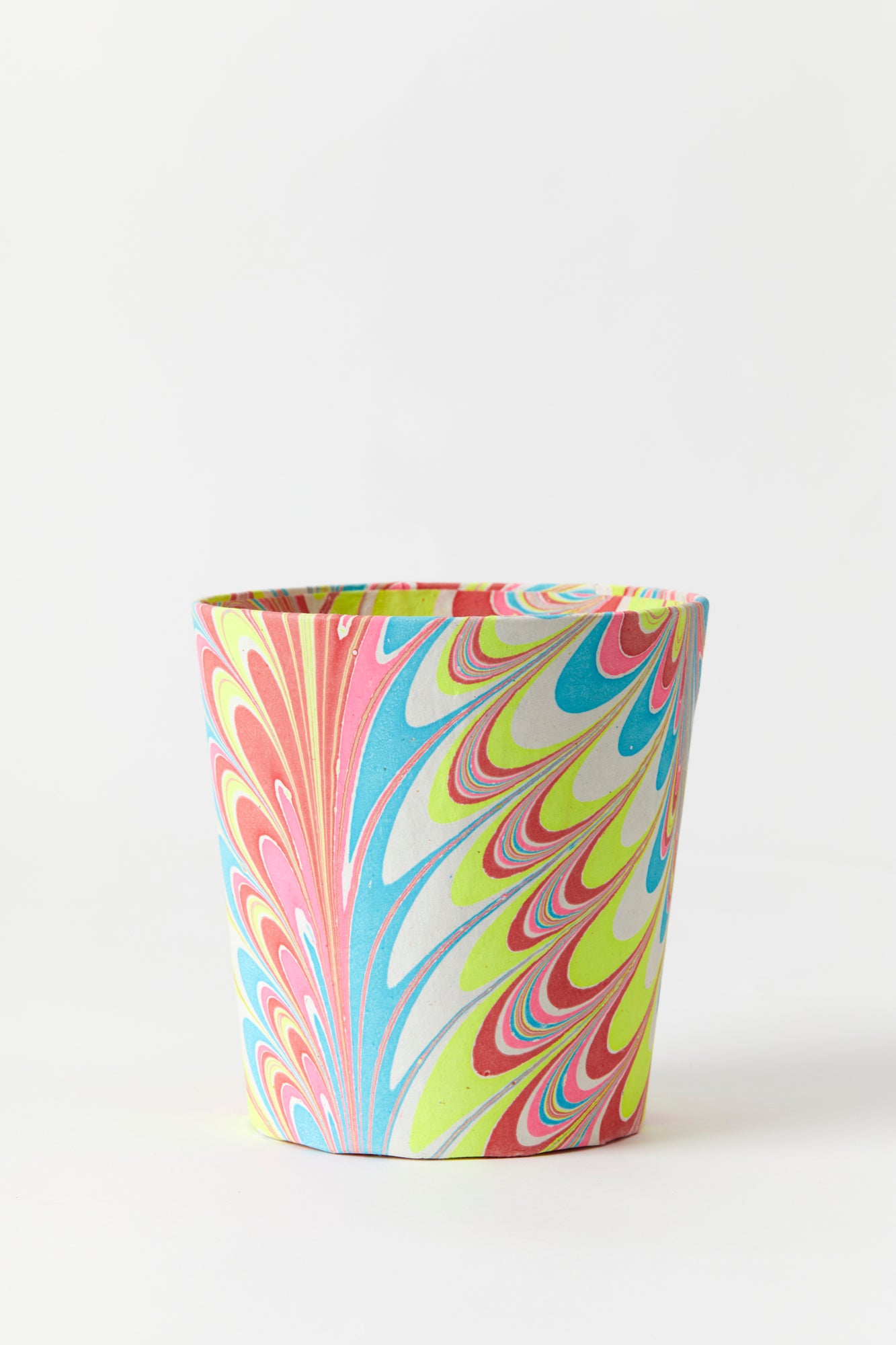 Artisan paper-covered cachepots with a plastic liner. Made to fit pots of standard seasonal bulbs or orchids.