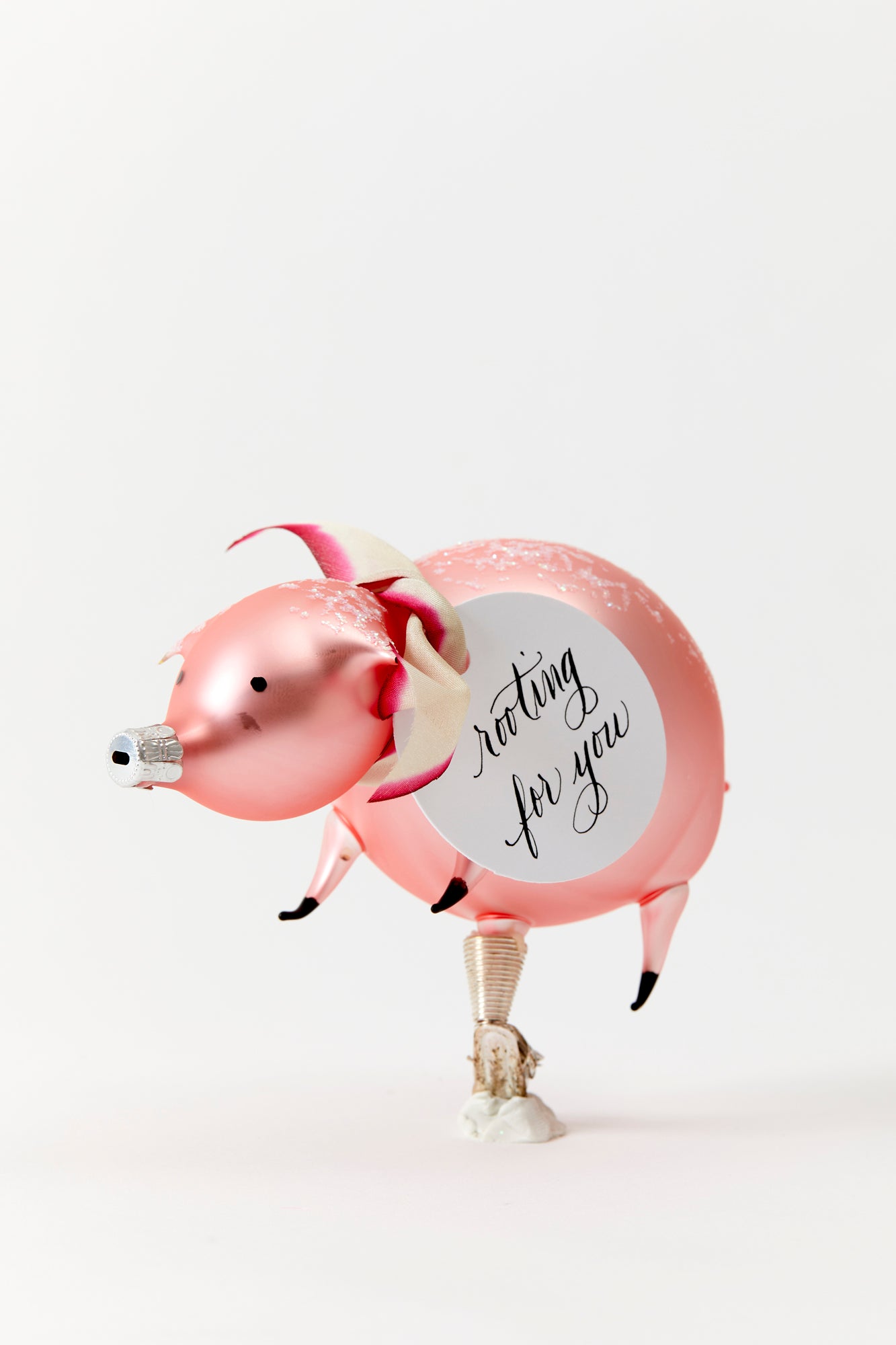Mouth-blown and hand-painted glass pig ornament crafted in Poland.