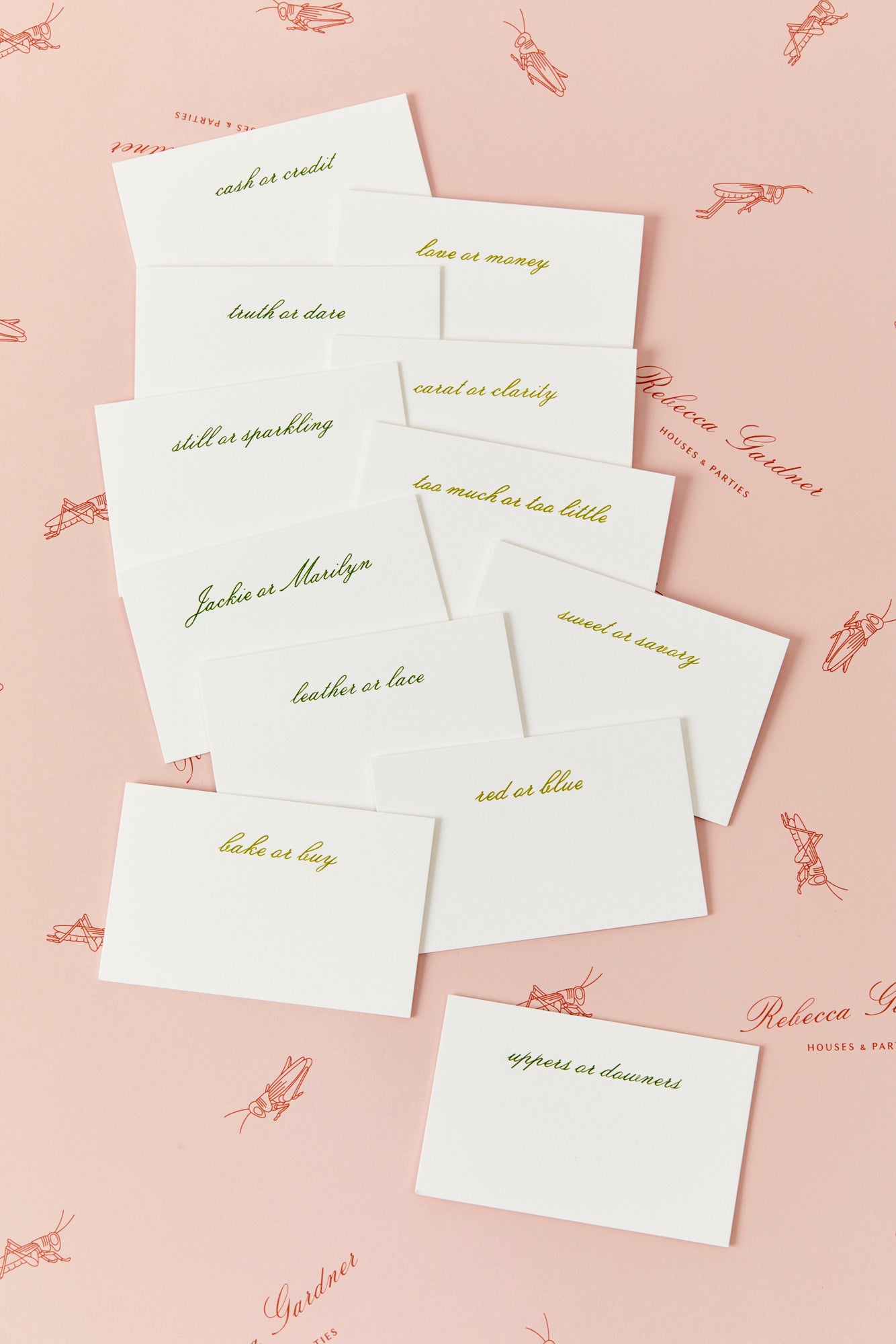 Set of 12 place cards engraved on heavy cardstock. Provocative questions include truth or dare, Jackie or Marilyn, and love or money.