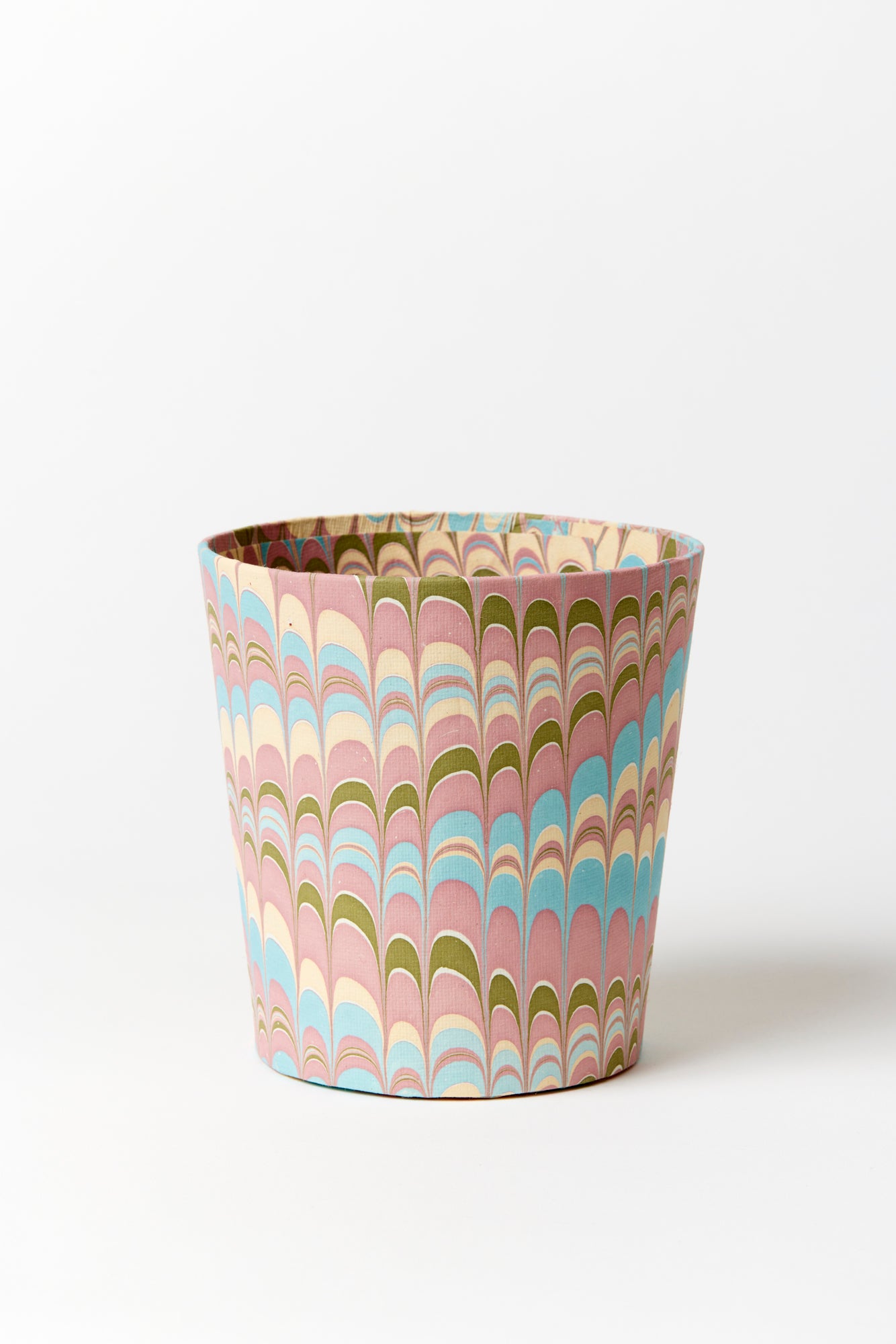 Artisan paper-covered cachepots with a plastic liner. Made to fit pots of standard seasonal bulbs or orchids.