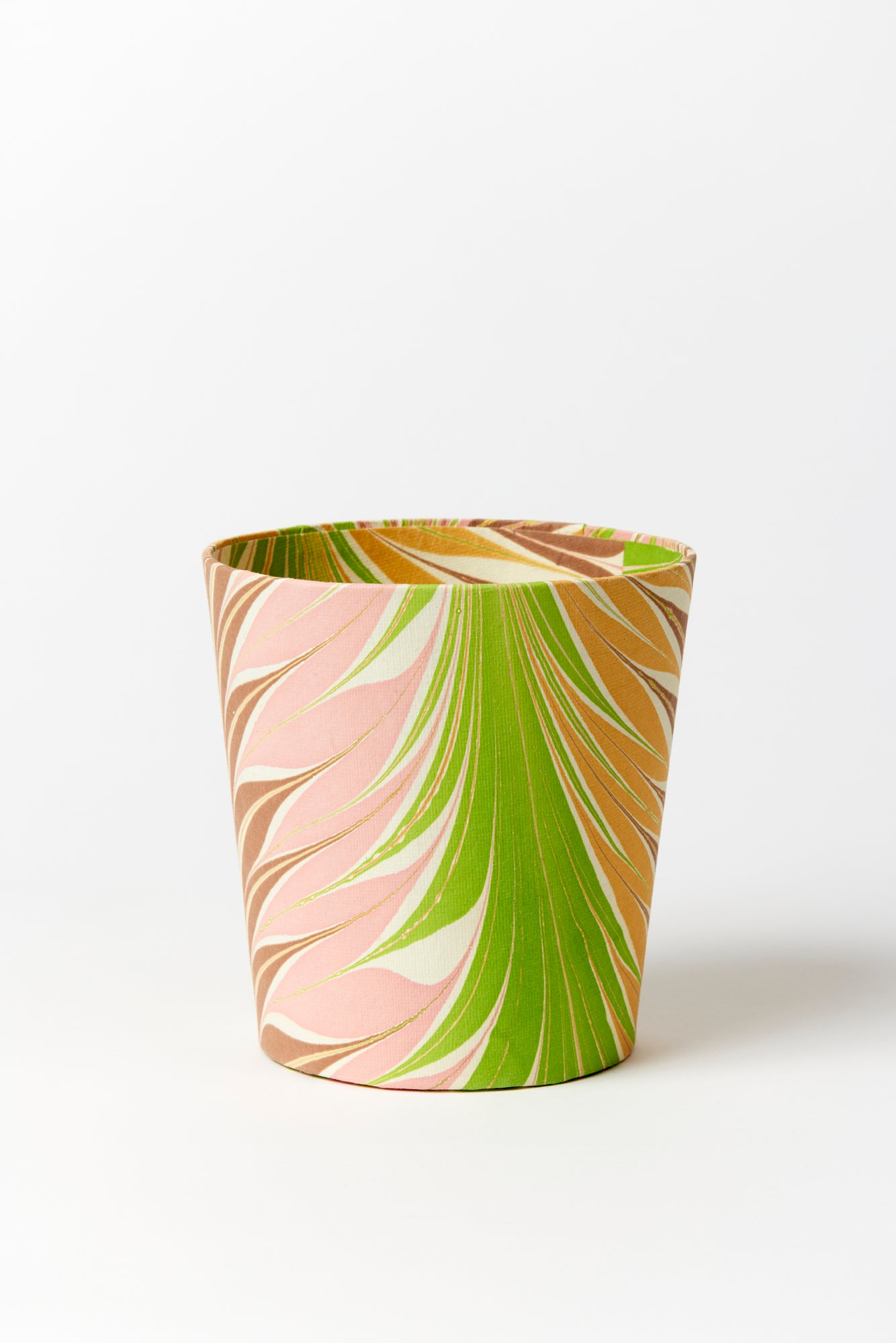 Artisan paper-covered cachepots with a plastic liner. Made to fit pots of standard seasonal bulbs or orchids.