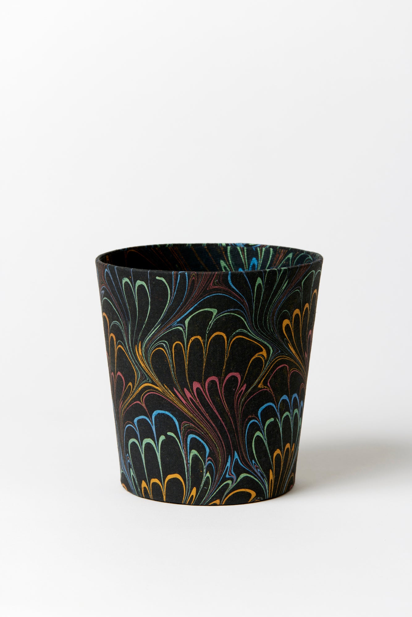 Artisan paper-covered cachepots with a plastic liner. Made to fit pots of standard seasonal bulbs or orchids.