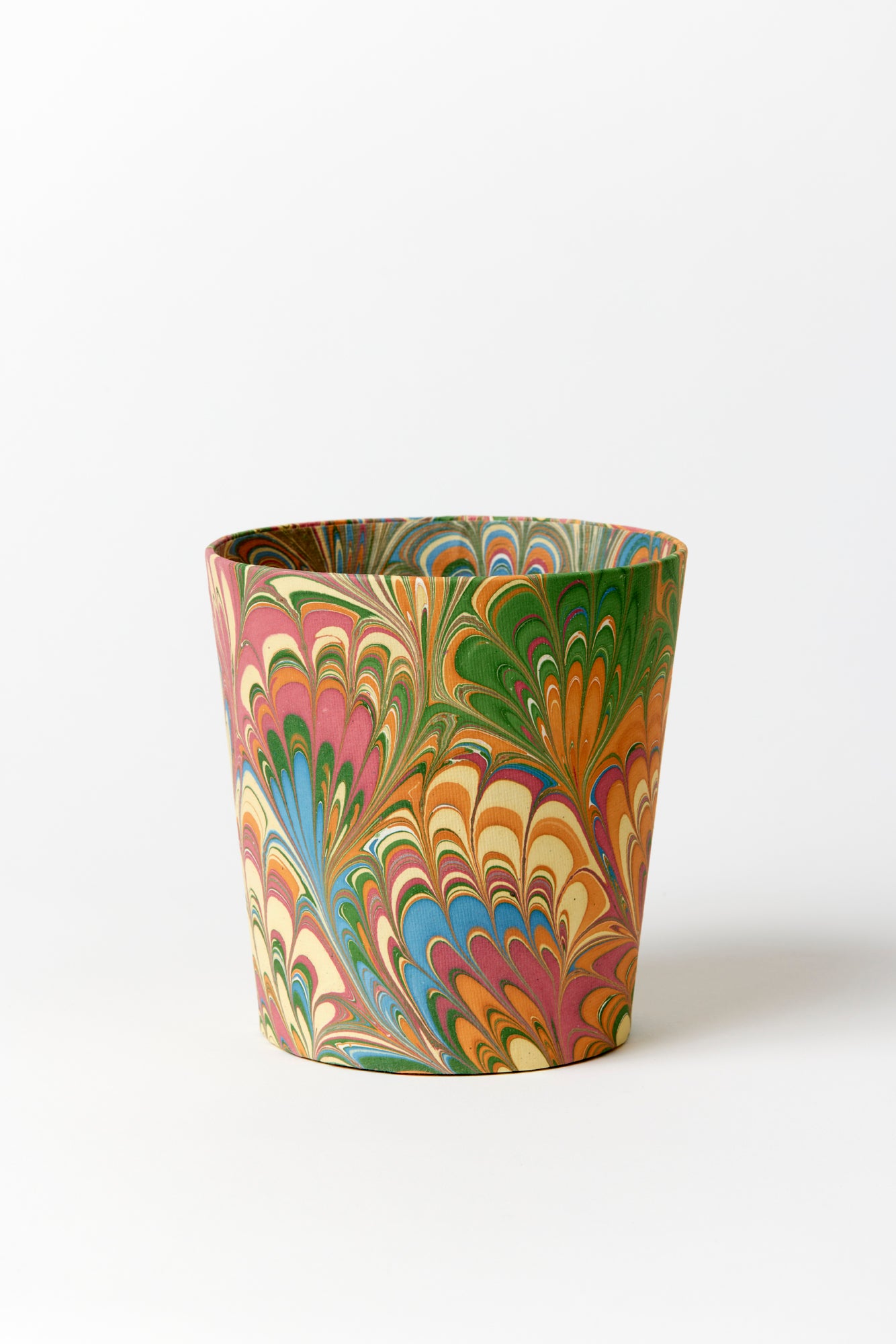 Artisan paper-covered cachepots with a plastic liner. Made to fit pots of standard seasonal bulbs or orchids.