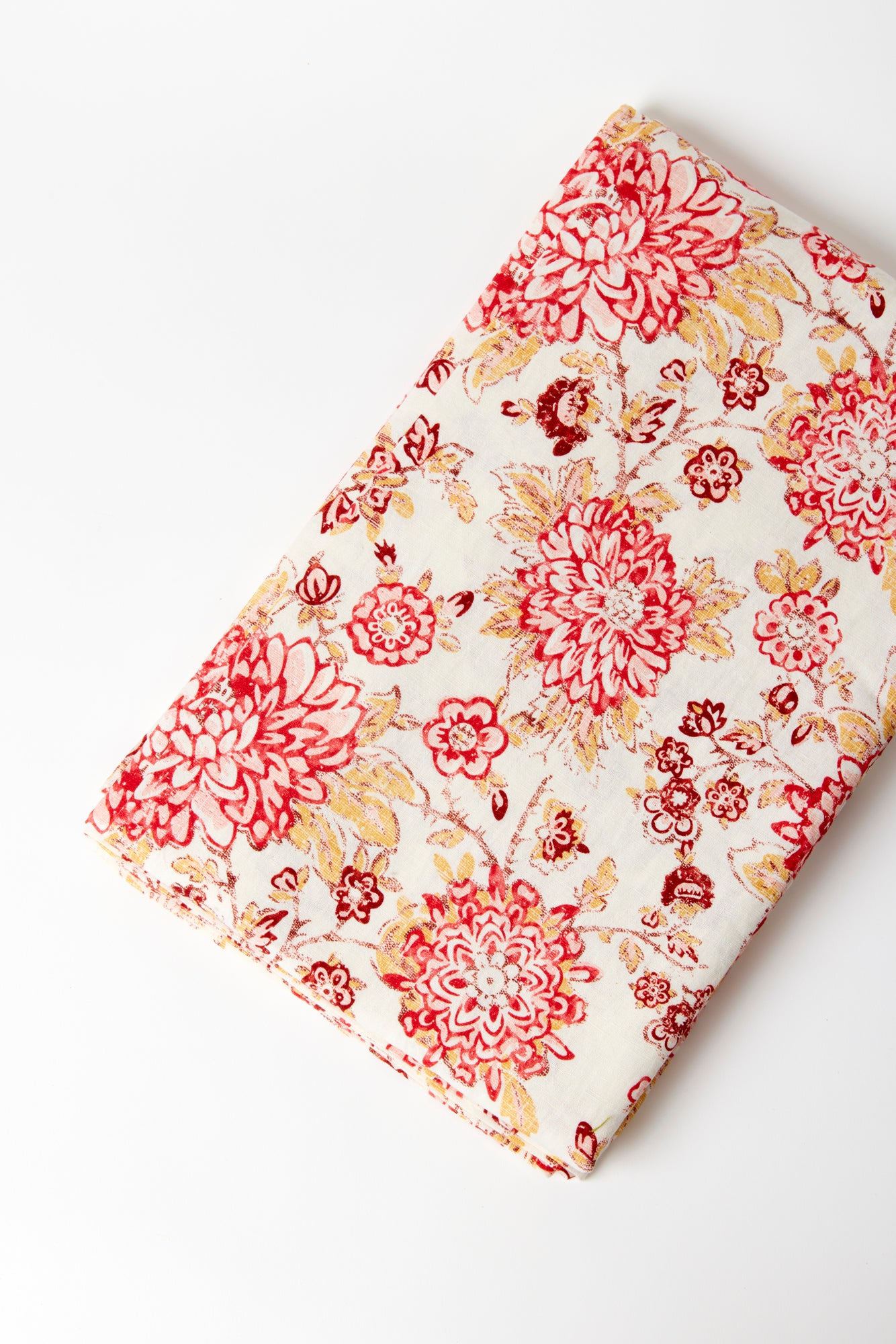 Spicy red and pink floral tablecloth to the floor.