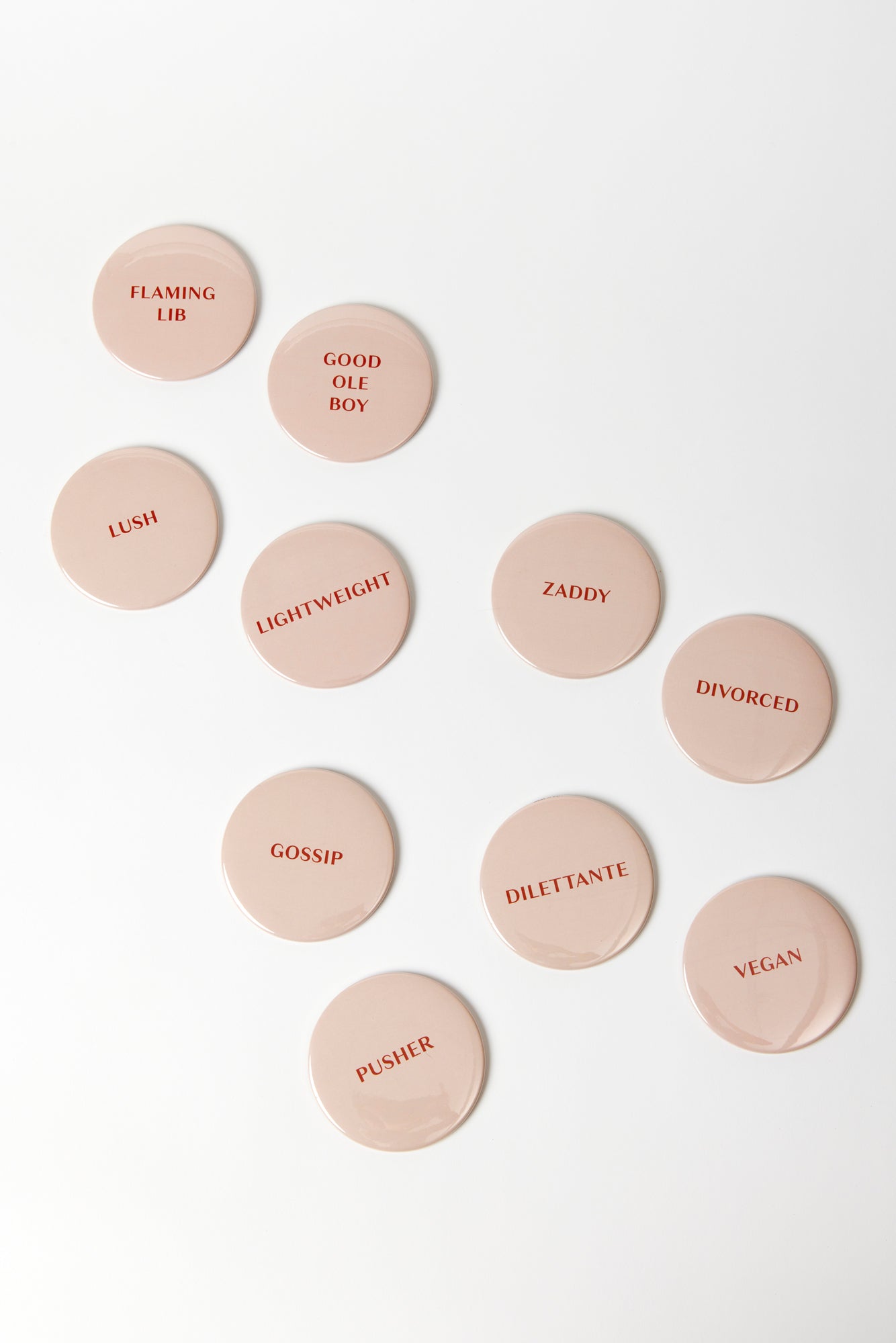 Buttons with different taglines for party favors.