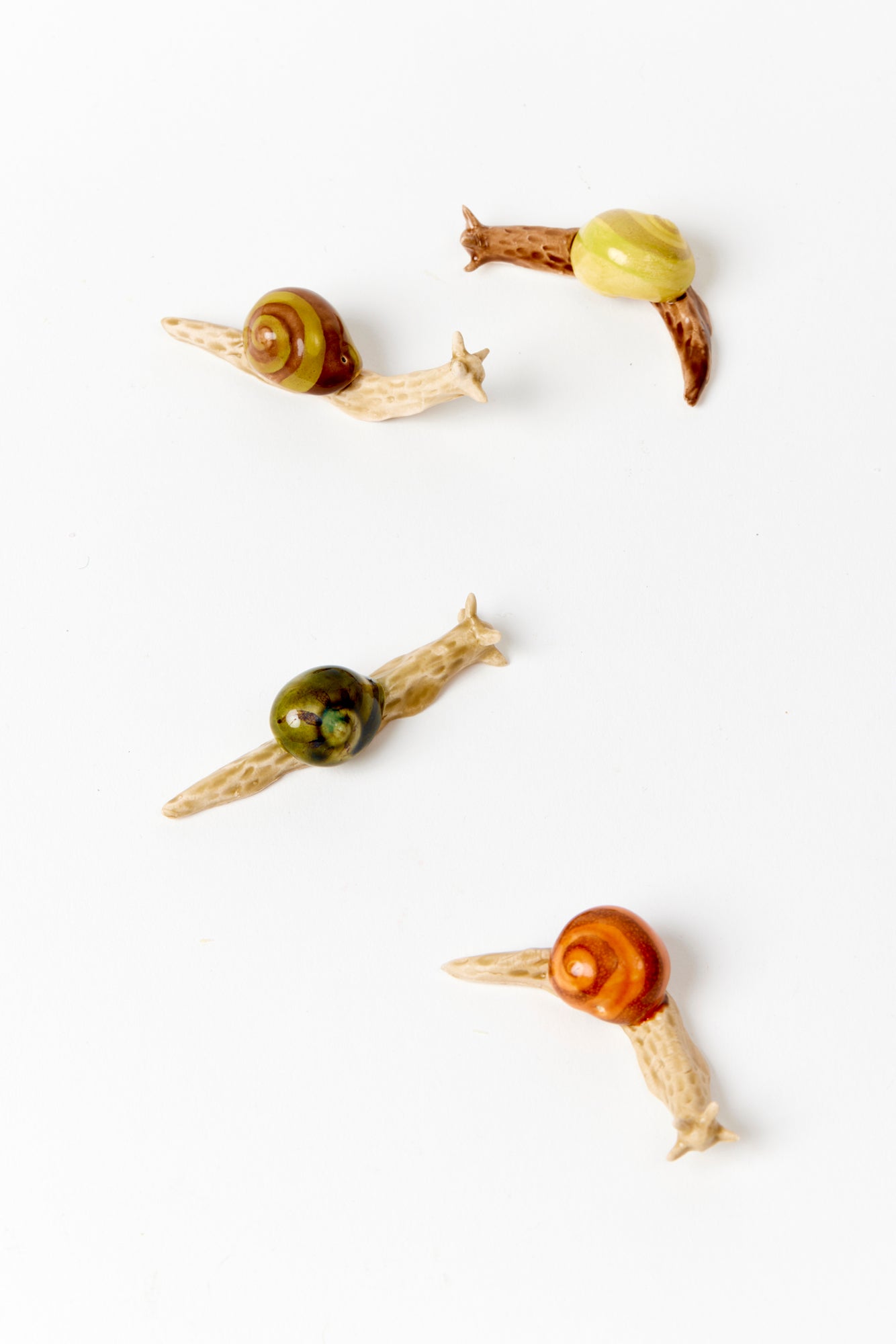 FAMILY OF 4 CERAMIC SNAILS