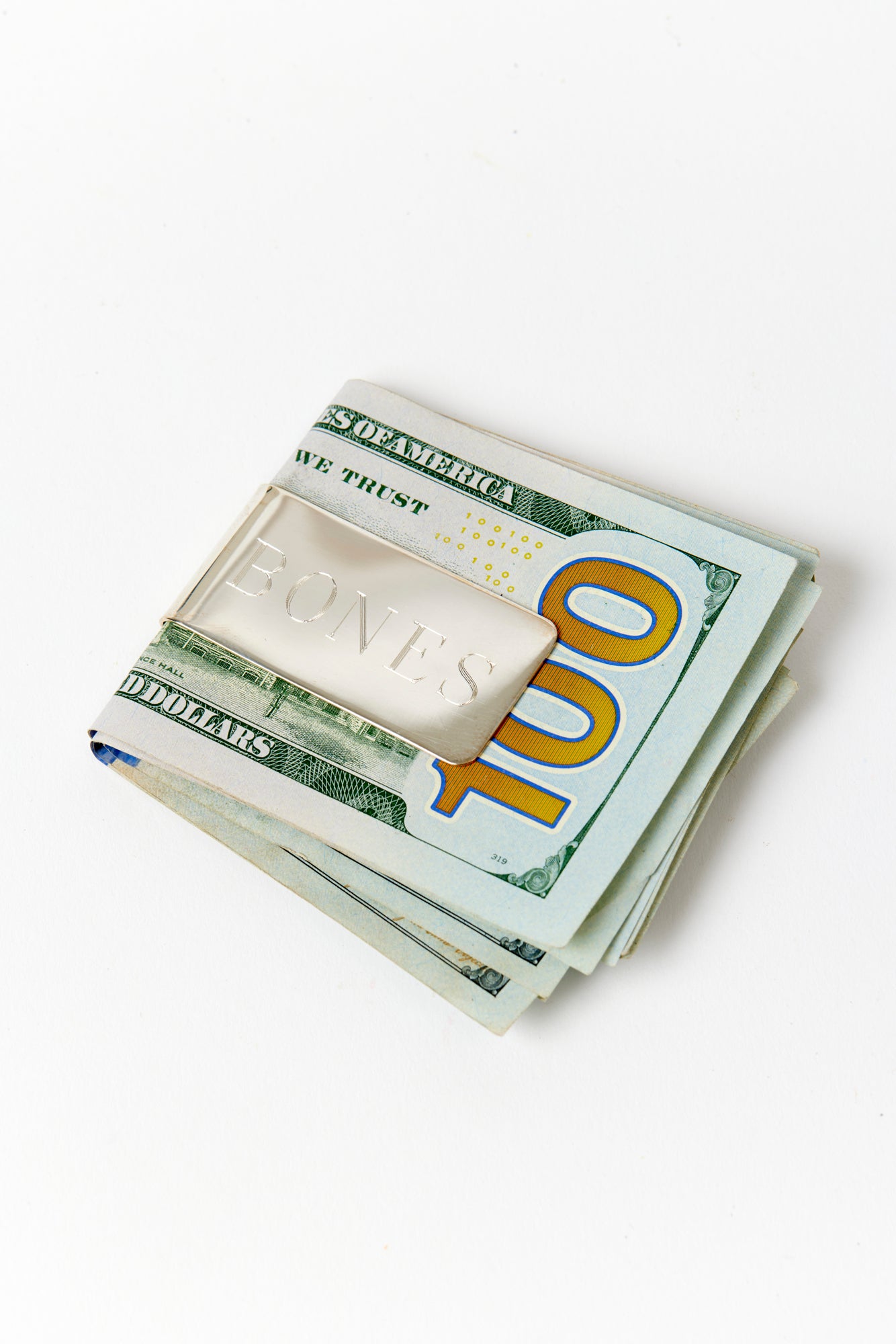 The perfect present for Big Papa is this Sterling money clip with hand-engraved “BONES” inscription.