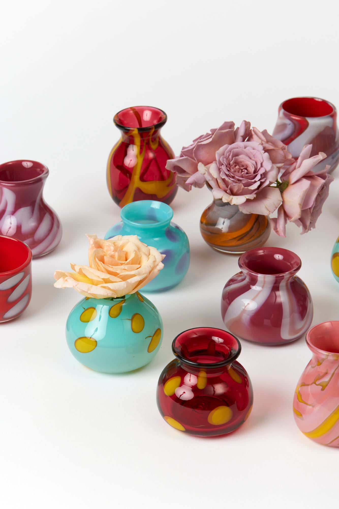 Handblown glass swirled bud vases. Made by Paul Arnhold.