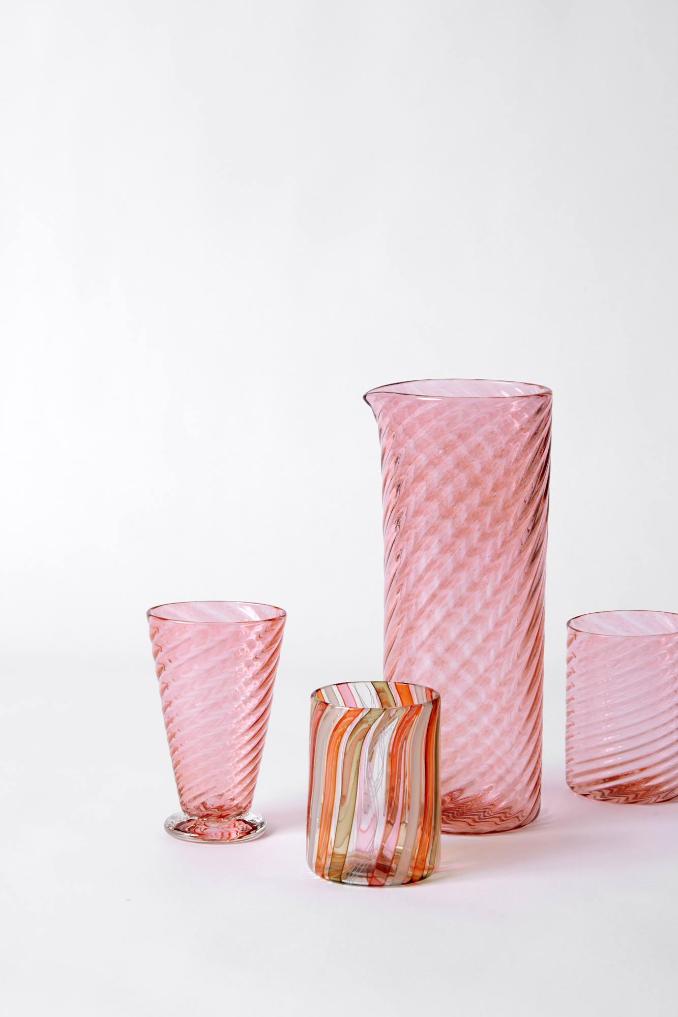 Handblown blush glass pitcher.