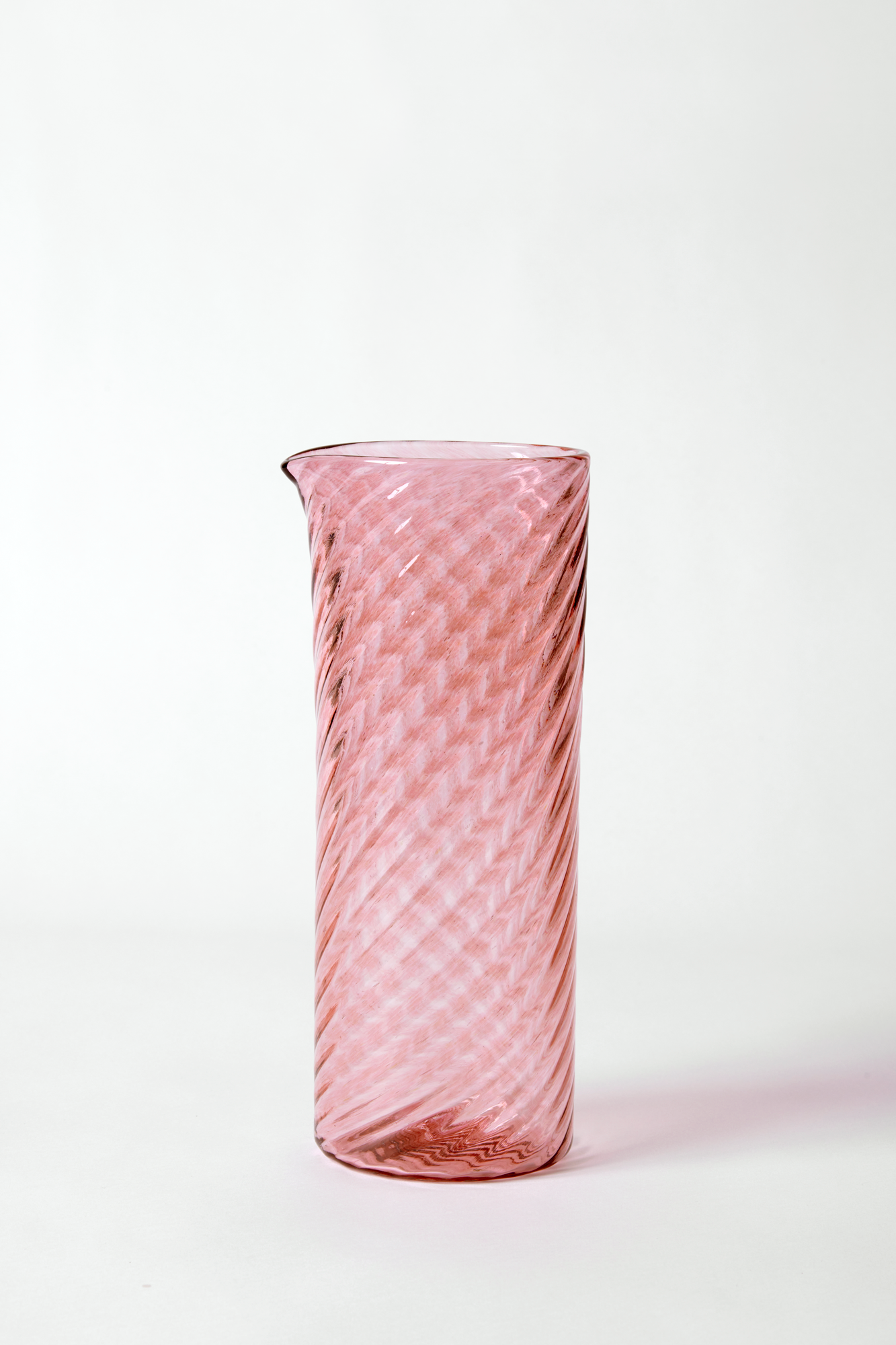 Handblown blush glass pitcher.