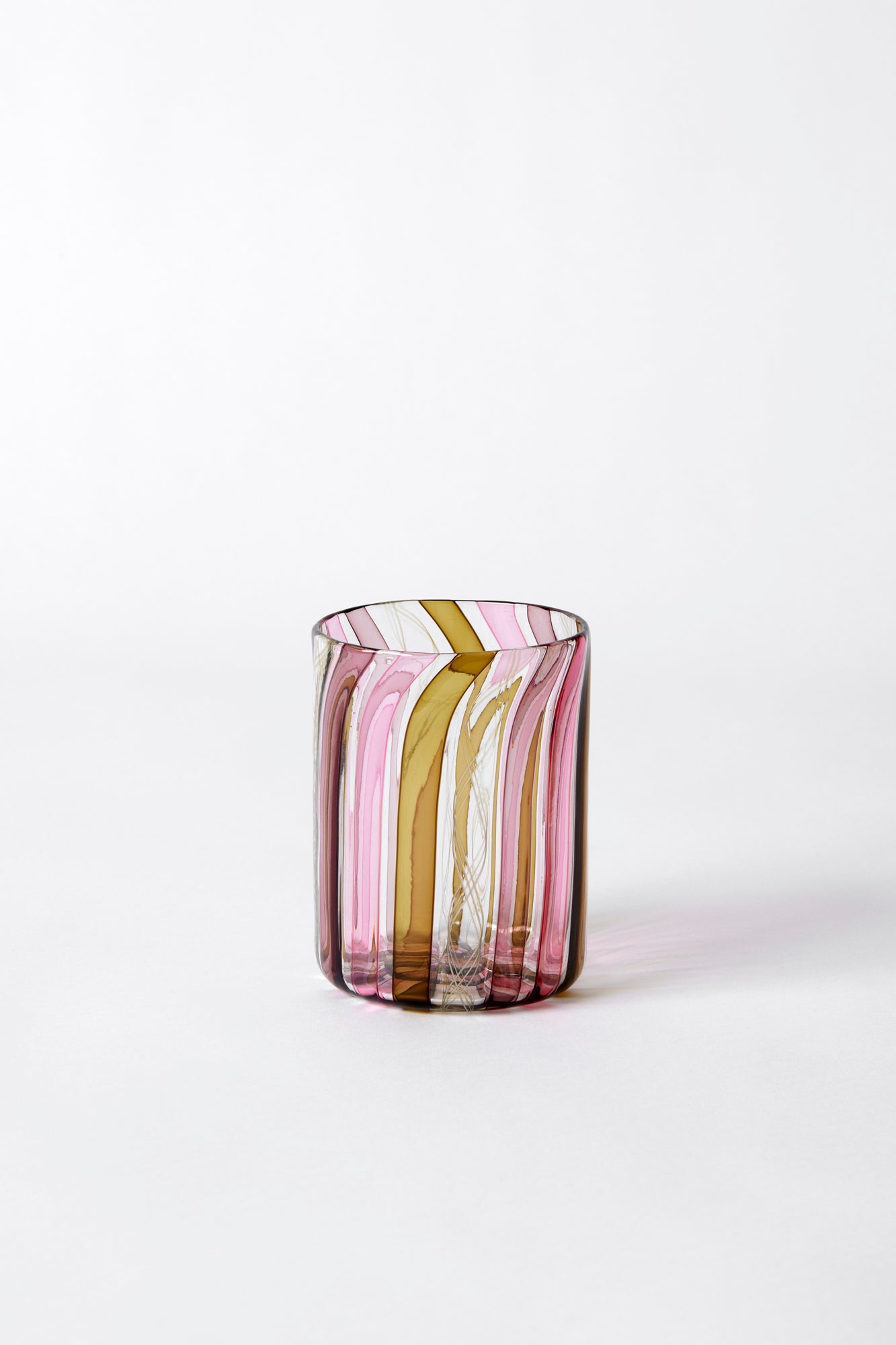 Hand-blown tumbler exclusively for Houses Parties using twisted glass canes by Tracy Glover in her Rhode Island studio.