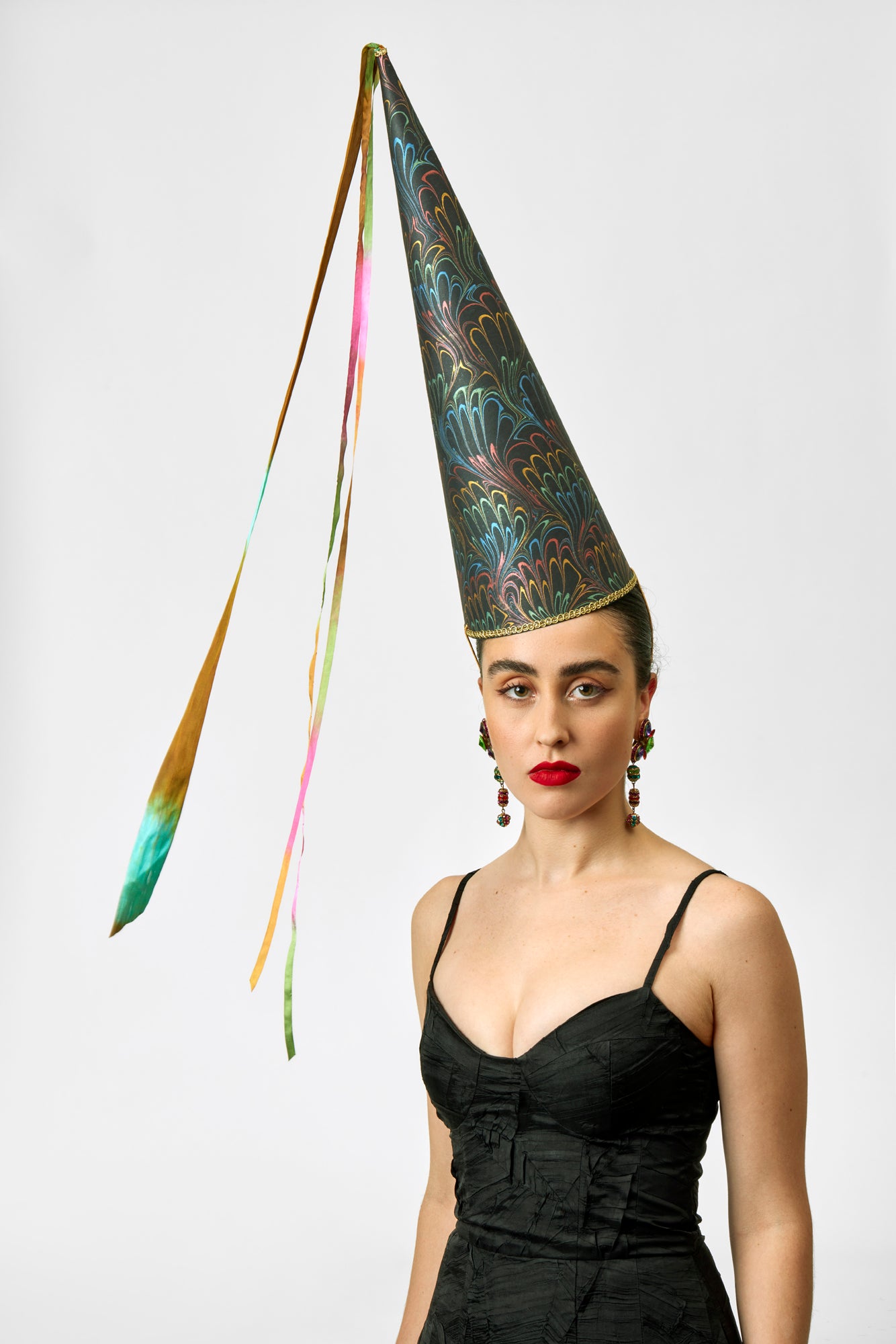 Tall marbled paper hennin hat.
