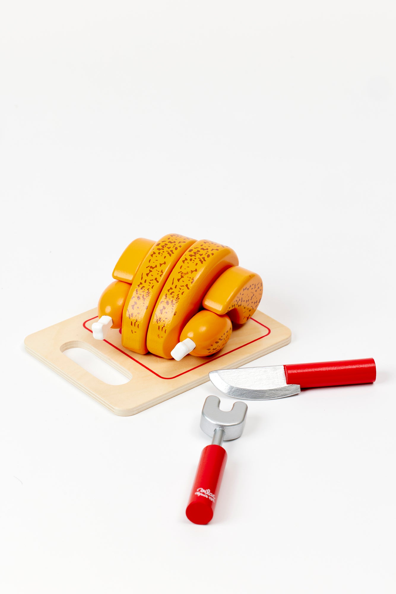 Wooden roast turkey with cutting board.