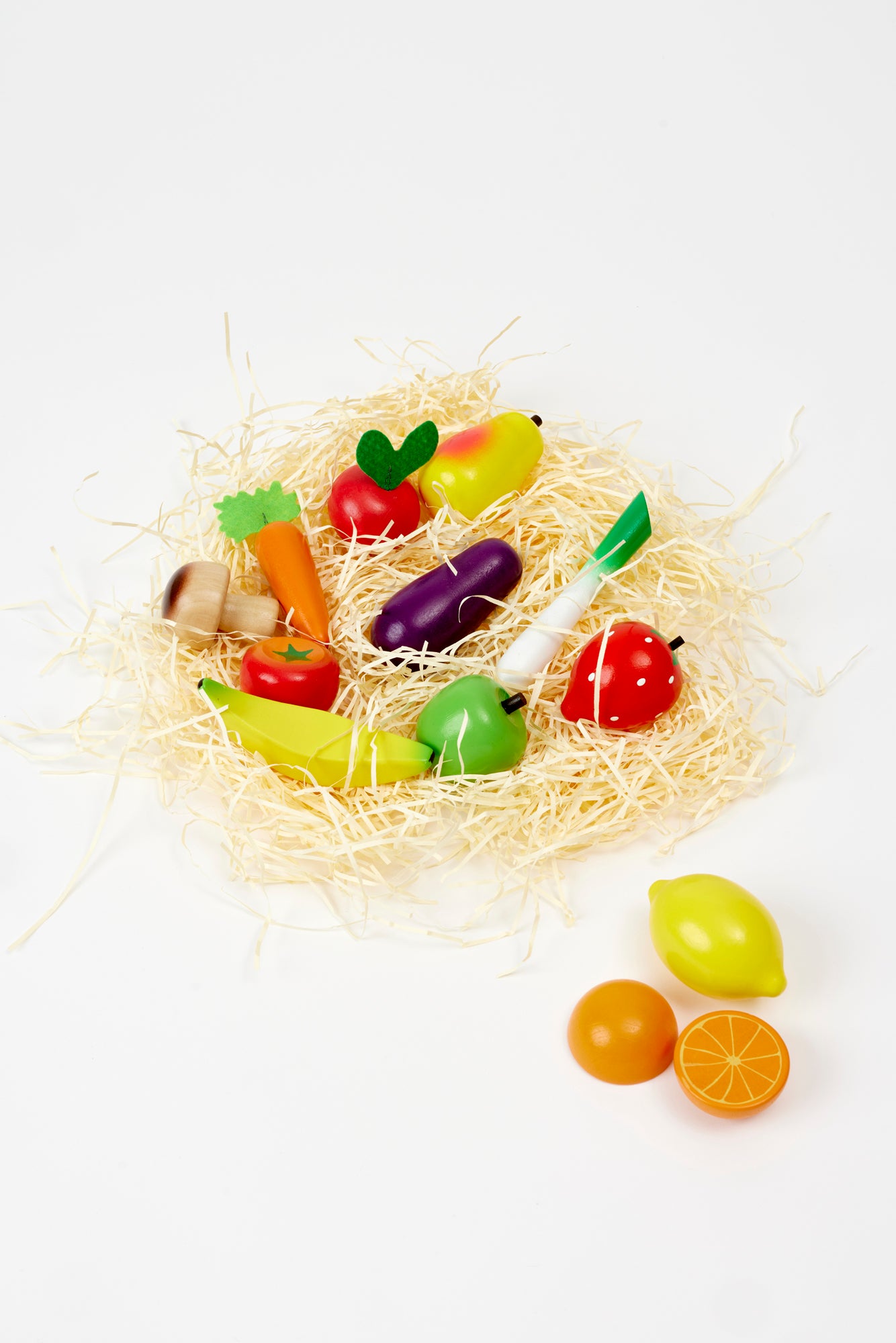 Set of 13 wooden veggies.