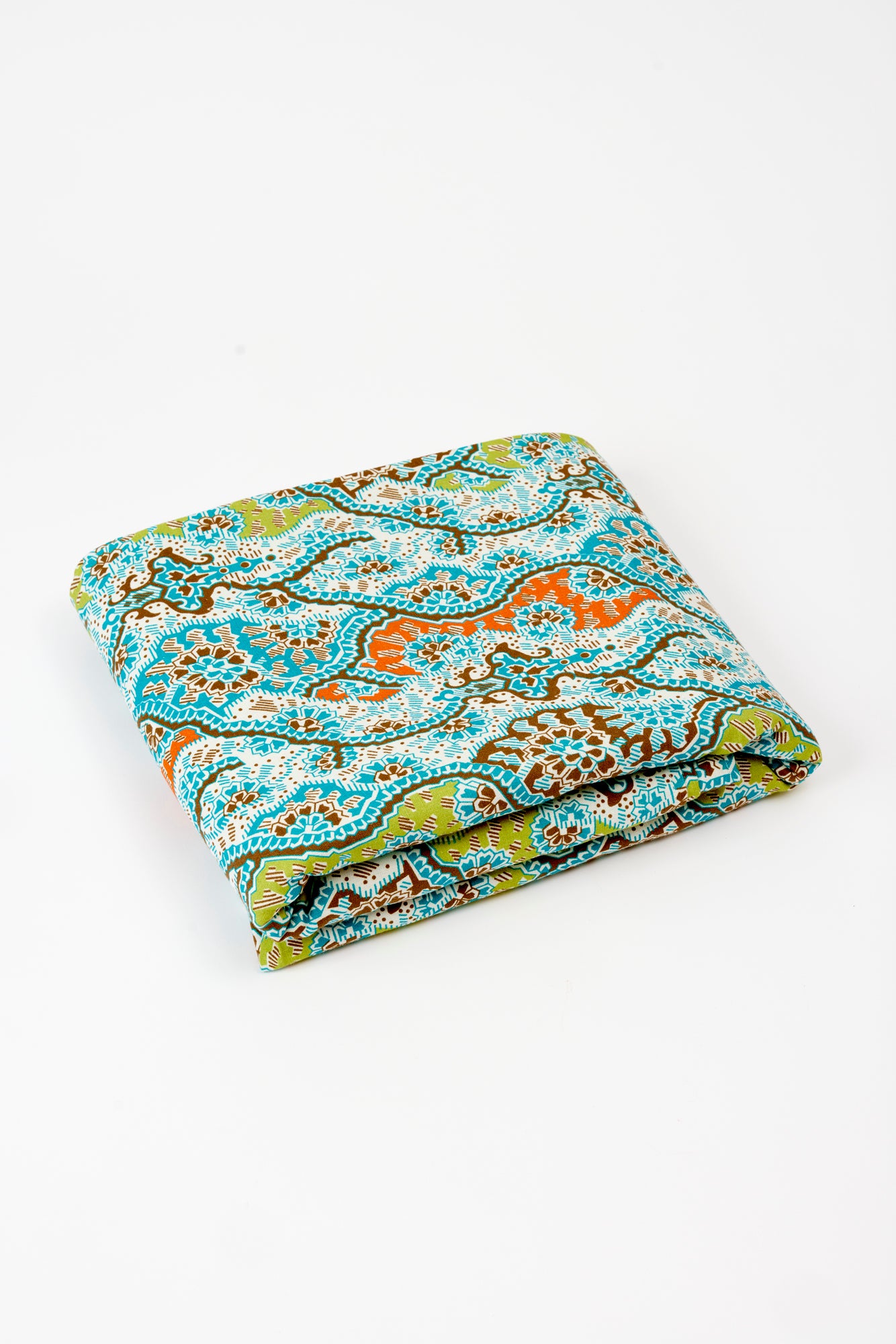 Gypset hand-blocked linen tablecloth to the floor.