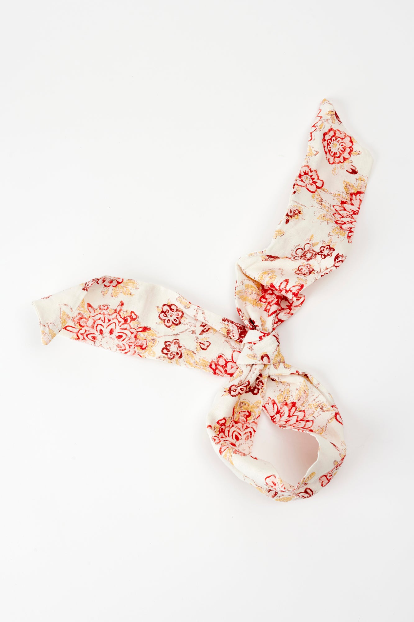 Patterned bunny ear head wrap.