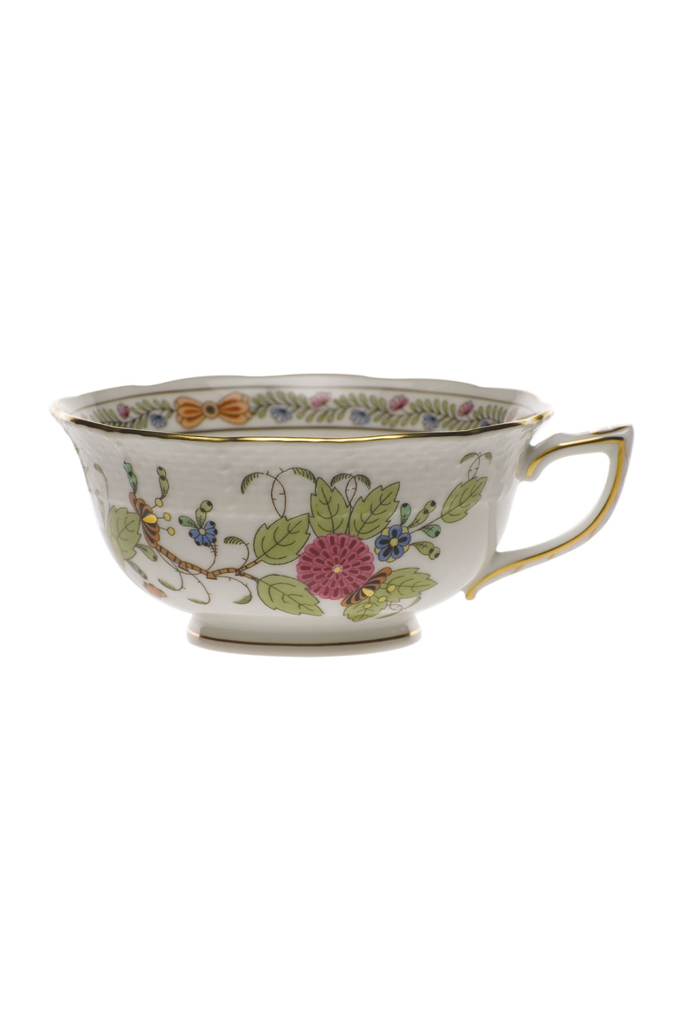 Porcelain dinnerware that has rich colors in an exotic pattern that stand alone with a solid cloth or add strong layers to a Bohemian look.