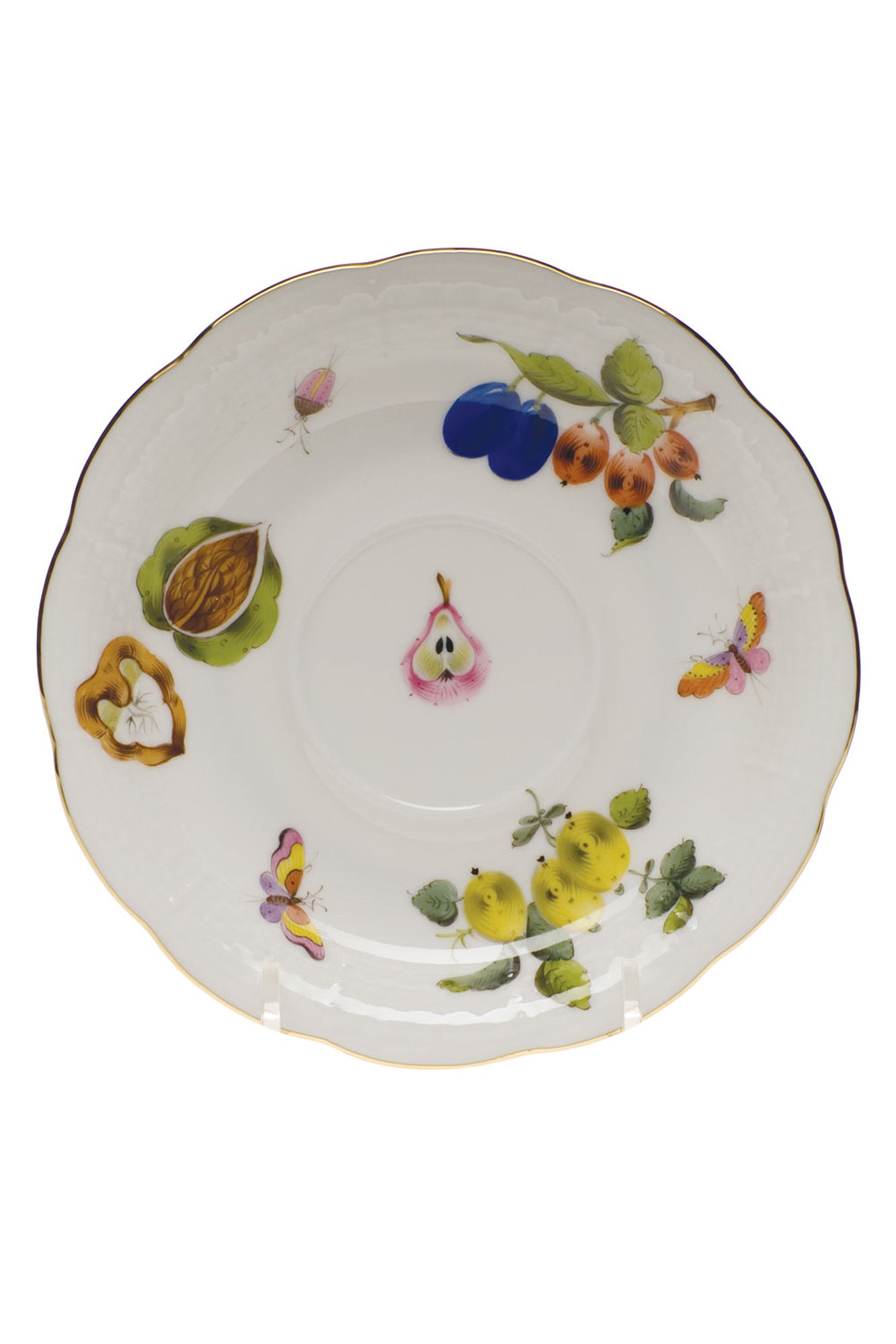 Market Garden designs on porcelain. Five piece place setting includes dinner plate, dessert plate, bread & butter plate and tea cup with saucer.