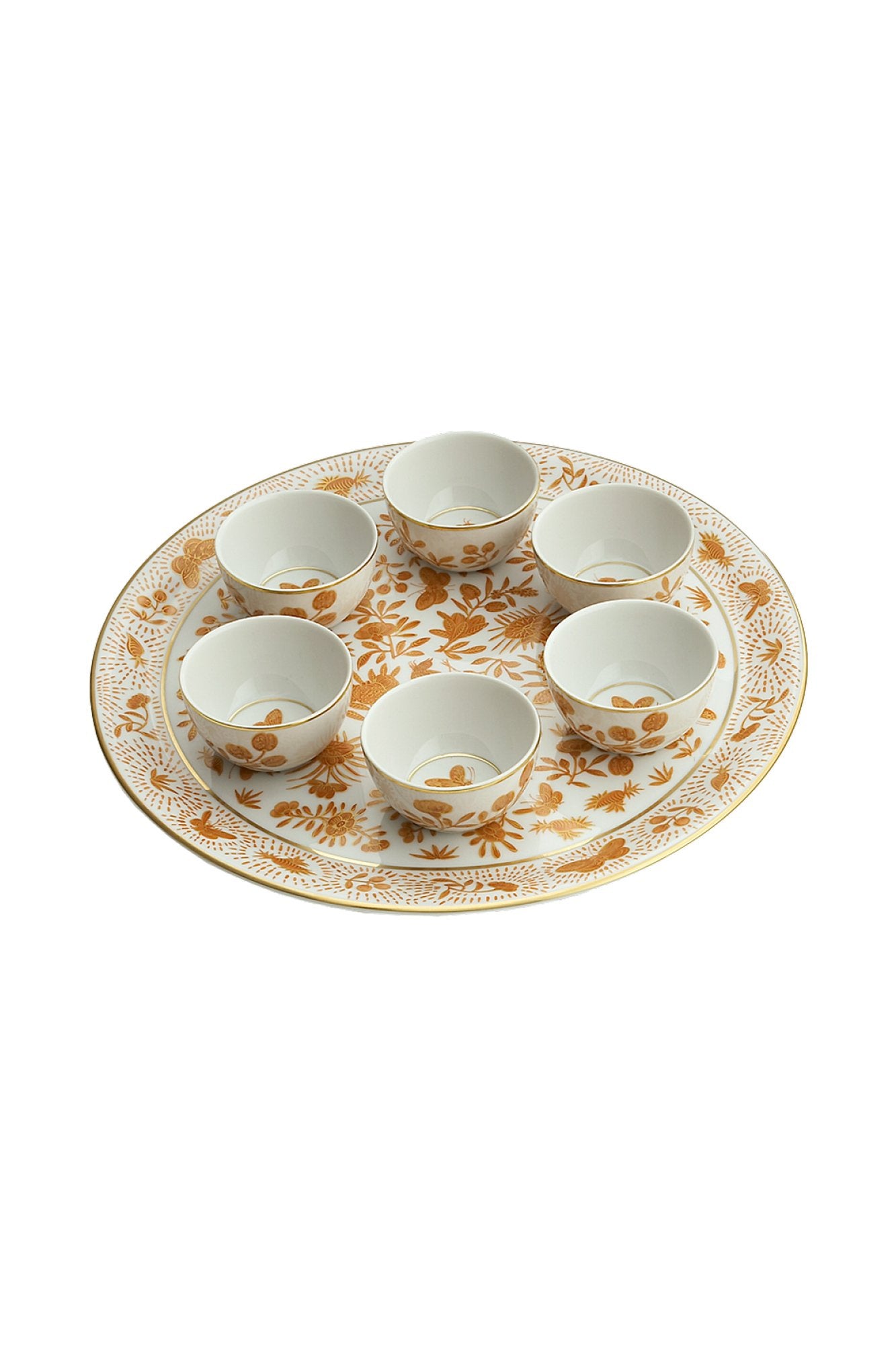 Sacred birds in orange print. Five piece place setting includes dinner plate, dessert plate, bread & butter plate and teacup with saucer.
