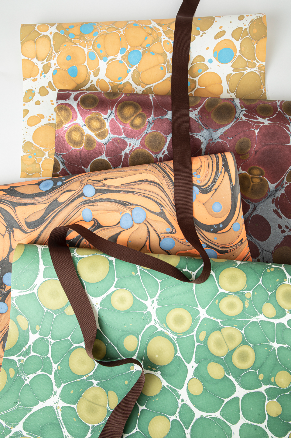 SET OF 4 OFF BEAT MARBLED GIFT WRAP.