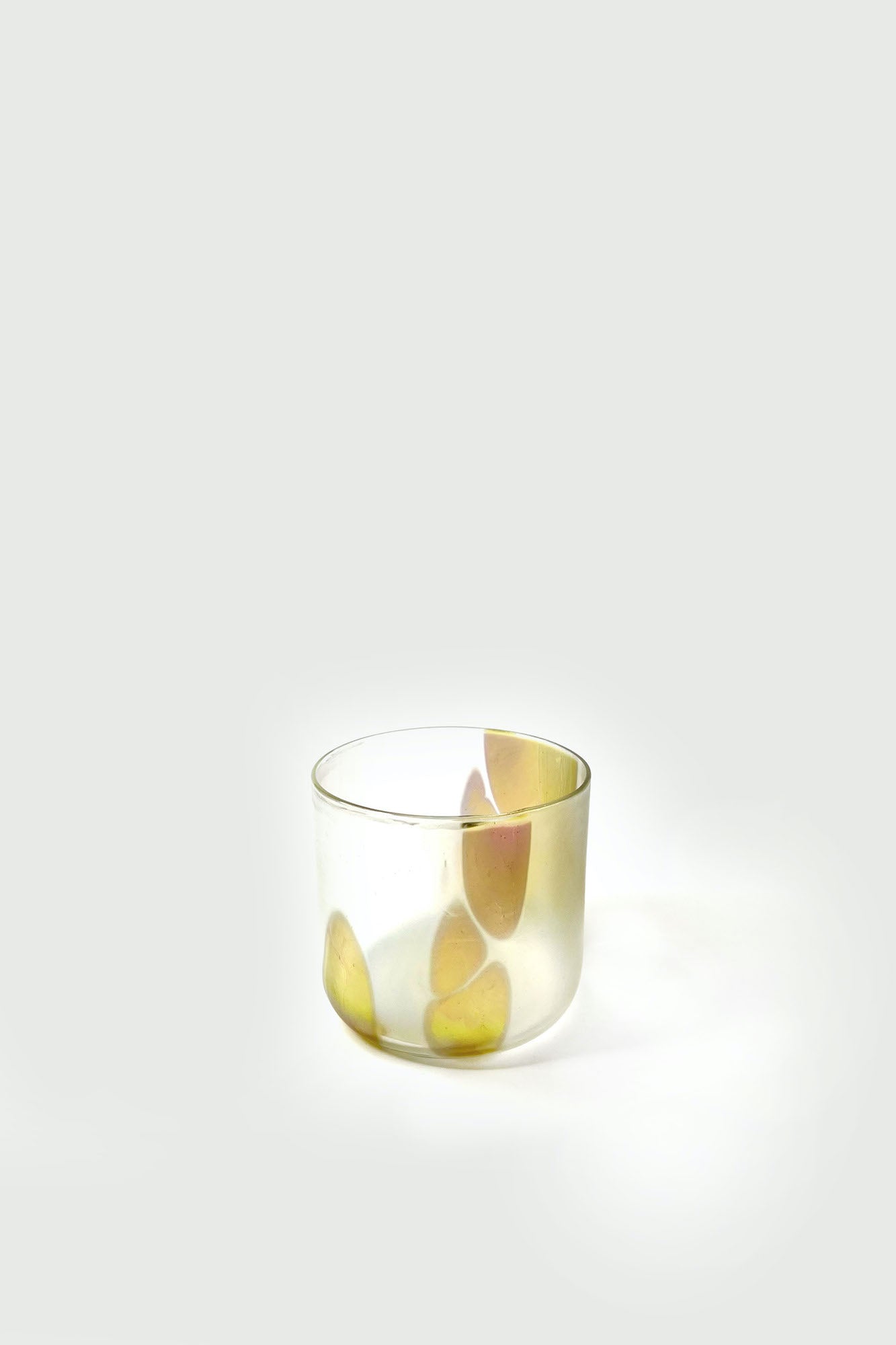 Small iridescent glass tumbler.