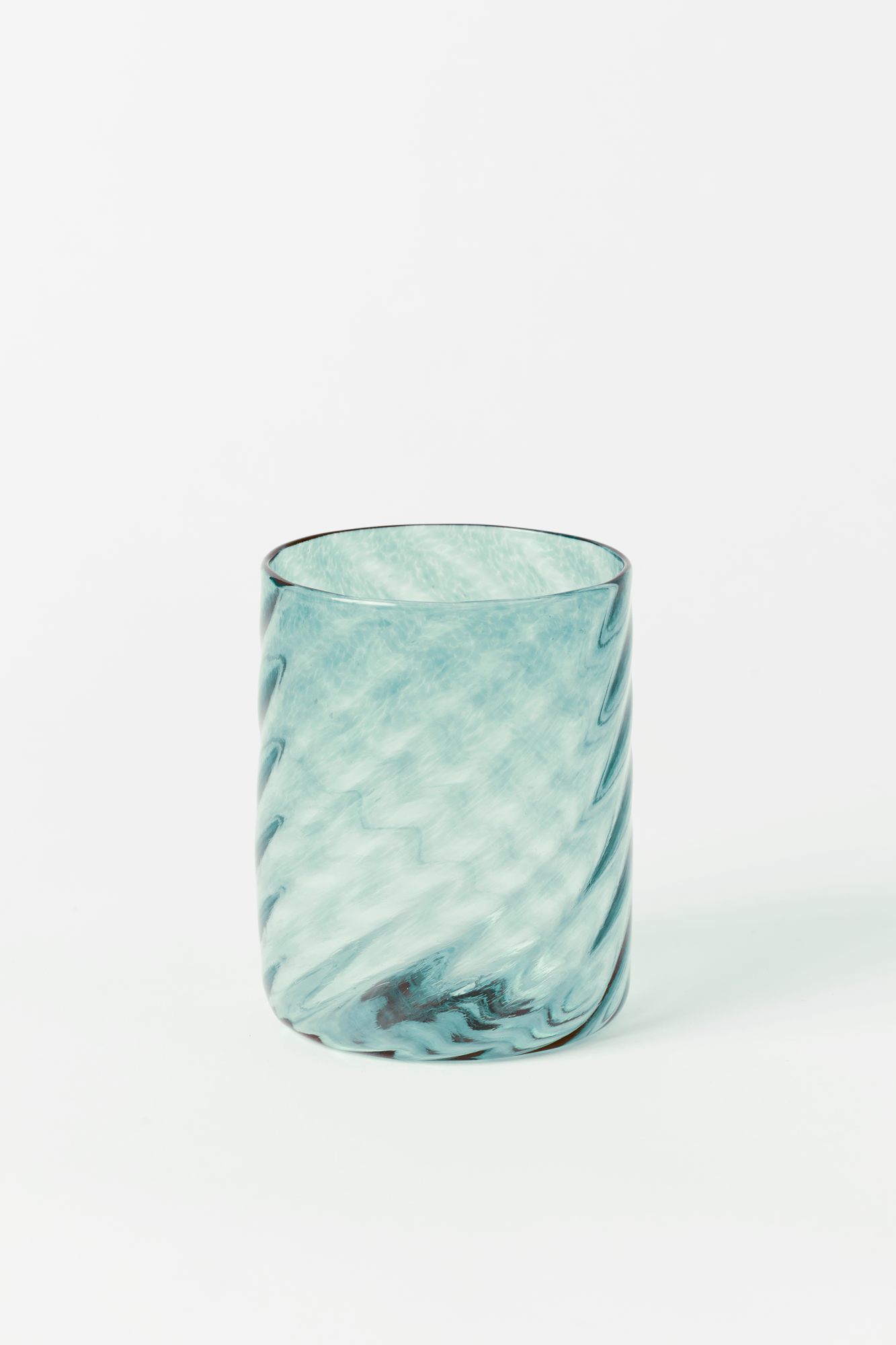 Twisted turquoise glass tumbler handblown by Tracy Glover in her Rhode Island studio.