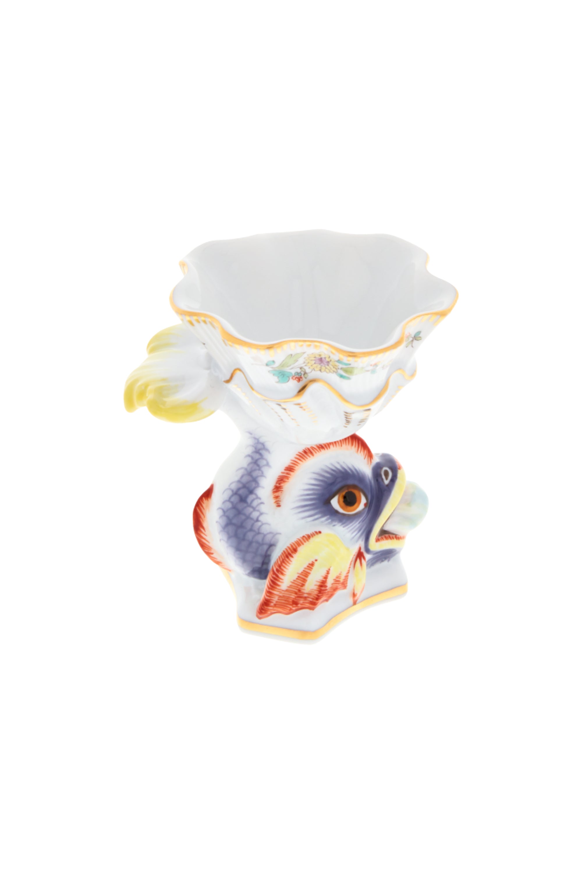 Designed by Johann Joachim Kändler, the pattern features a delicate background with radiating bands based on a scallop shell and a central well dressed with a pair of swans on water amid bullrushes, swooping cranes, and fish. Several parts of the service depict figures from Greco-Roman mythology, like Glaucus and the dolphin-riding Galatea.