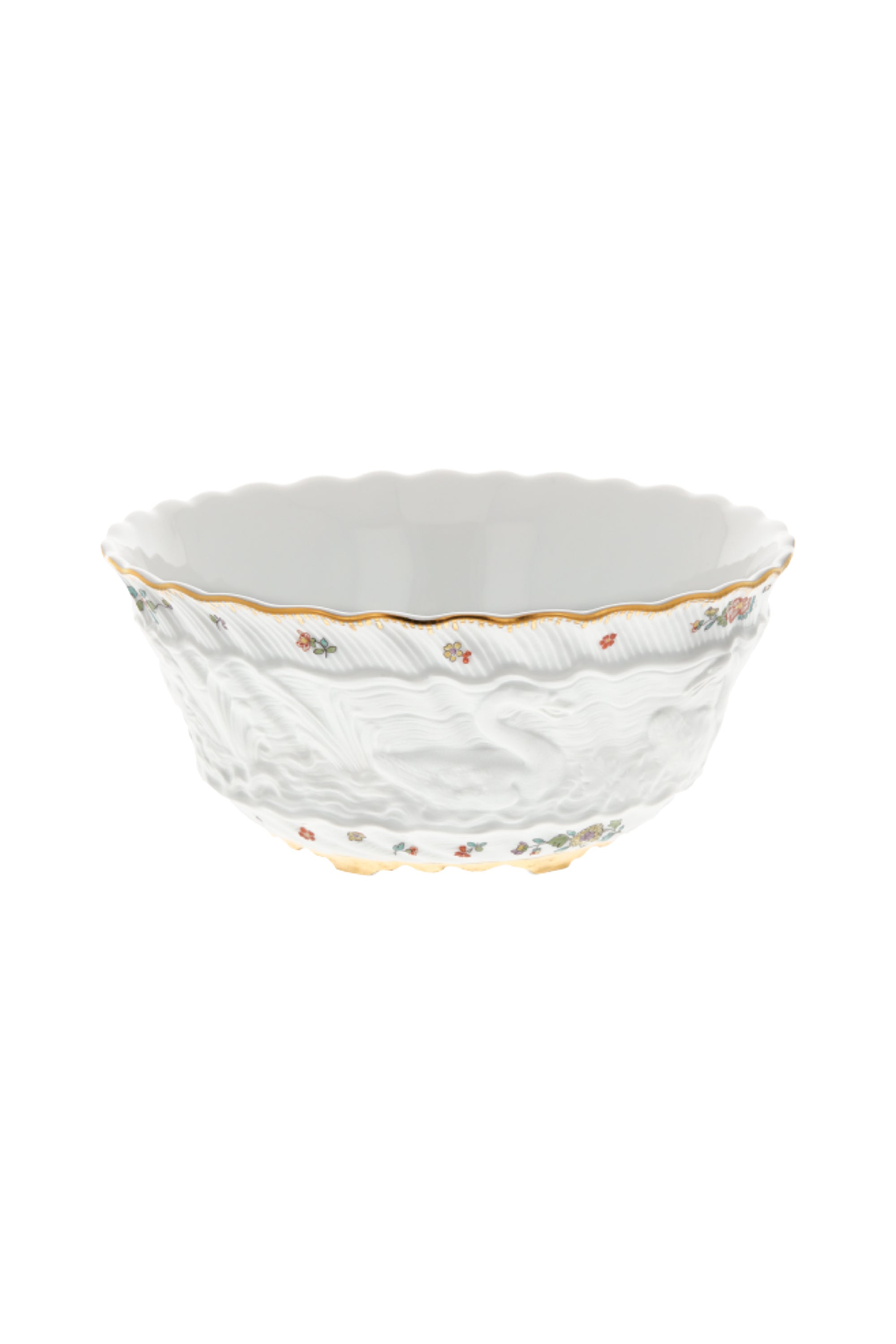 Designed by Johann Joachim Kändler, the pattern features a delicate background with radiating bands based on a scallop shell and a central well dressed with a pair of swans on water amid bullrushes, swooping cranes, and fish. Several parts of the service depict figures from Greco-Roman mythology, like Glaucus and the dolphin-riding Galatea.