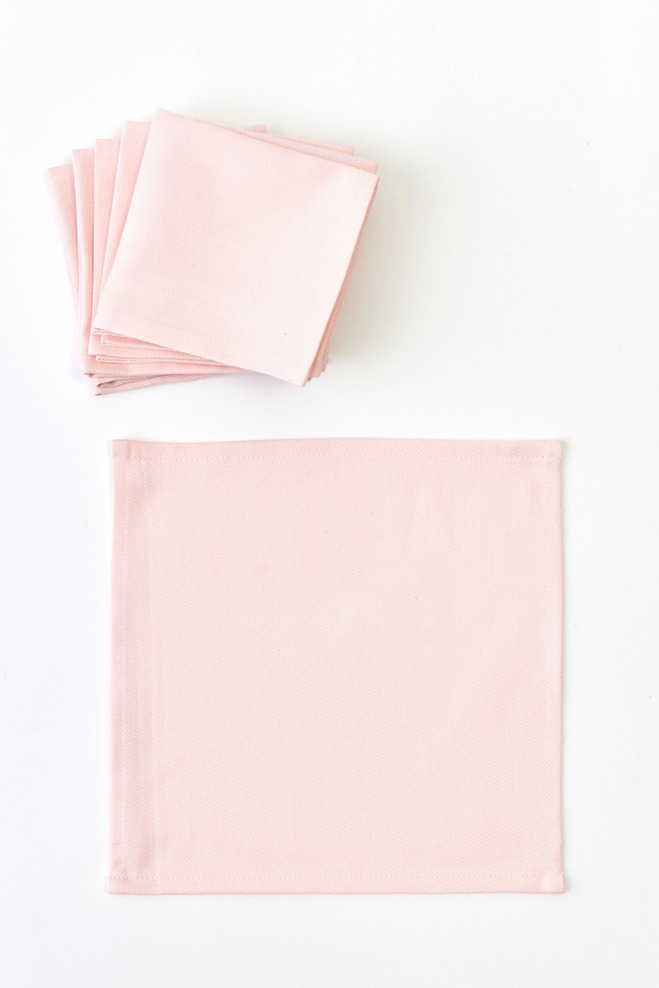 SET OF 6 COLOR BLOCK FOLDING COCKTAIL NAPKINS.