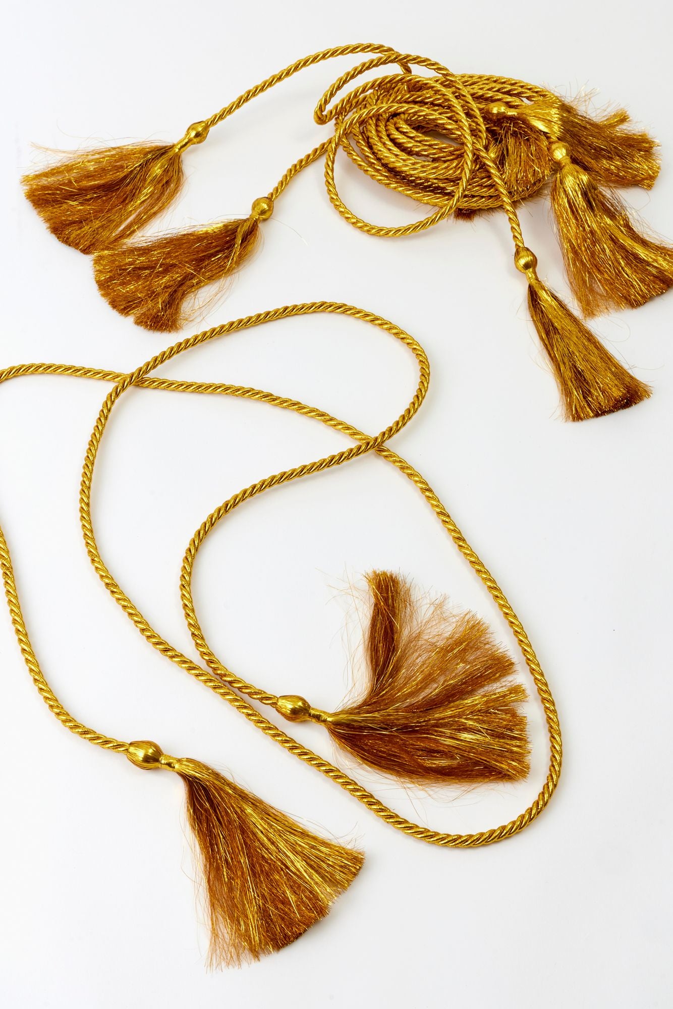 SET OF 6 GOLD TINSEL TASSELS.