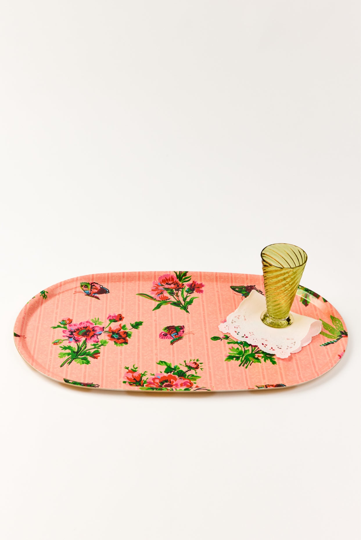 Floral-patterned pink laminated tray with butterflies and flowers on a white background.