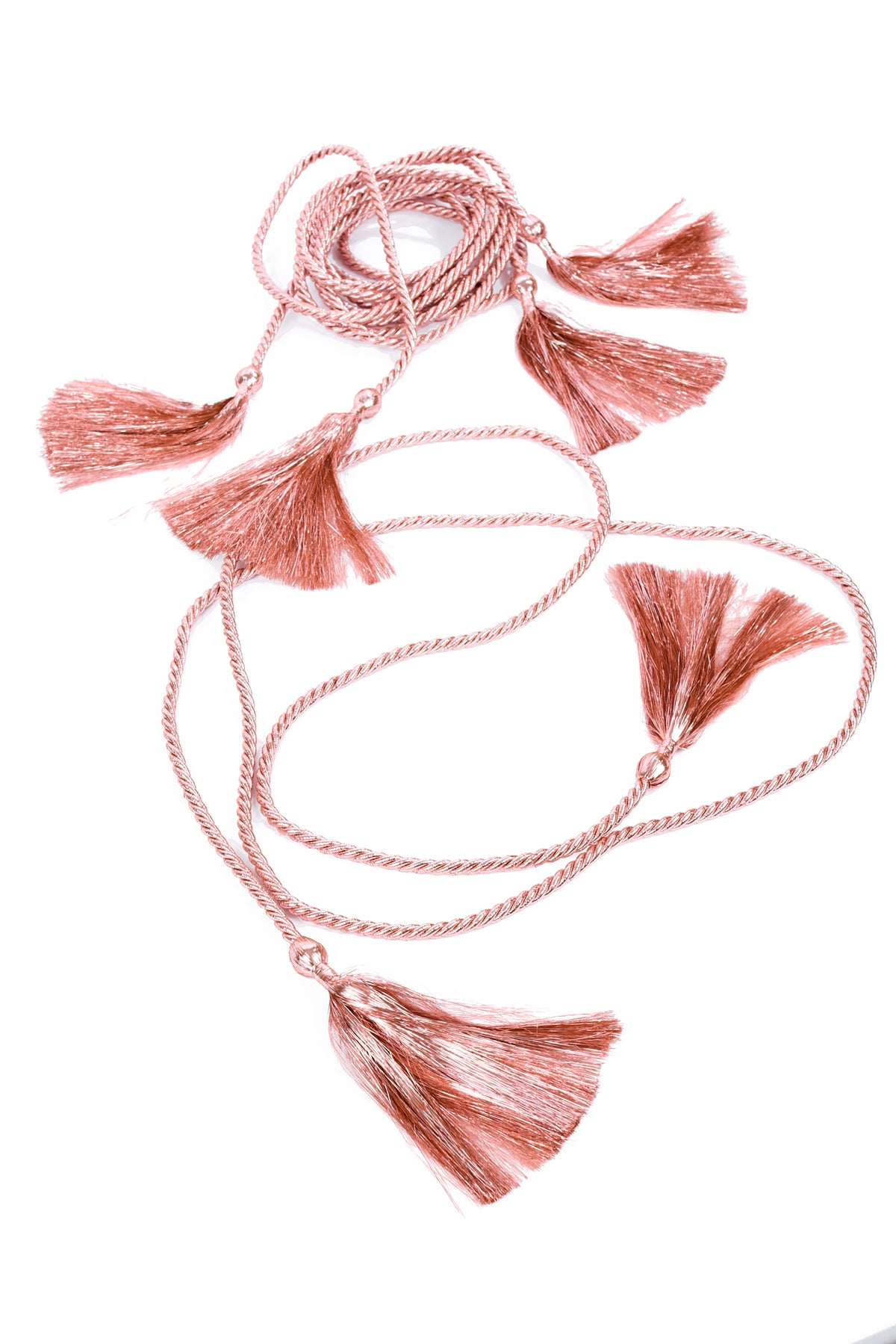 A rose gold tassel necklace with a twisted rope chain and multiple tassel ends, displayed on a clean white background.