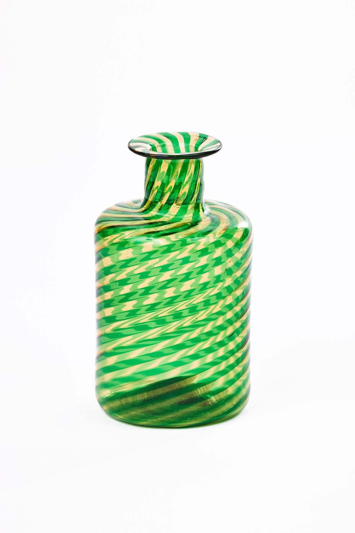 A small decorative glass bottle with a narrow neck and flared rim, featuring a vibrant green and pale yellow diagonal striped pattern, set against a plain white background.